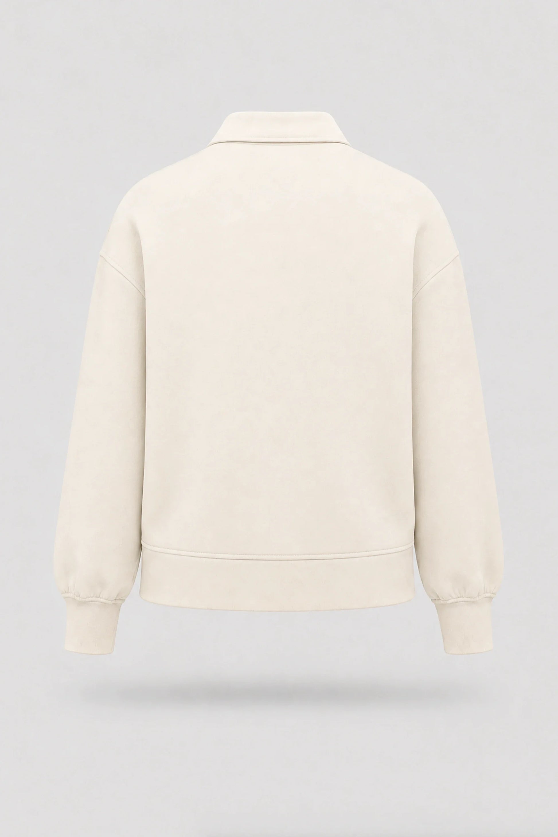 Back view of women's Ivory knit polo sweatshirt with rib-knit details and soft stretch fabric