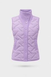 Women's lavender lightweight puffer vest with quilted insulation, reversible design, and rib-knit funnel collar