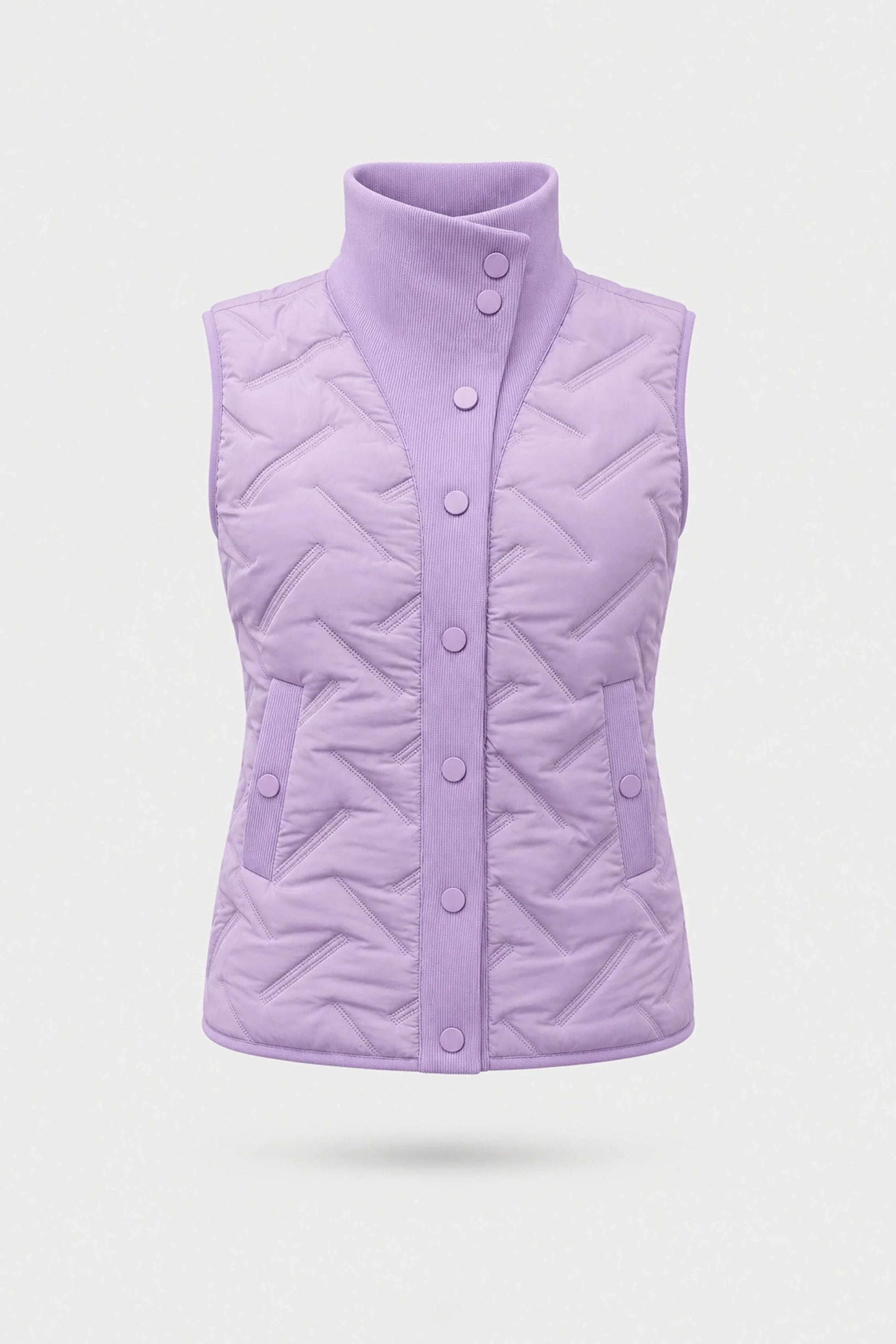 Women's lavender lightweight puffer vest with quilted insulation, reversible design, and rib-knit funnel collar