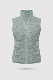 Women's Sage Grey lightweight puffer vest with quilted insulation, reversible design, and rib-knit funnel collar
