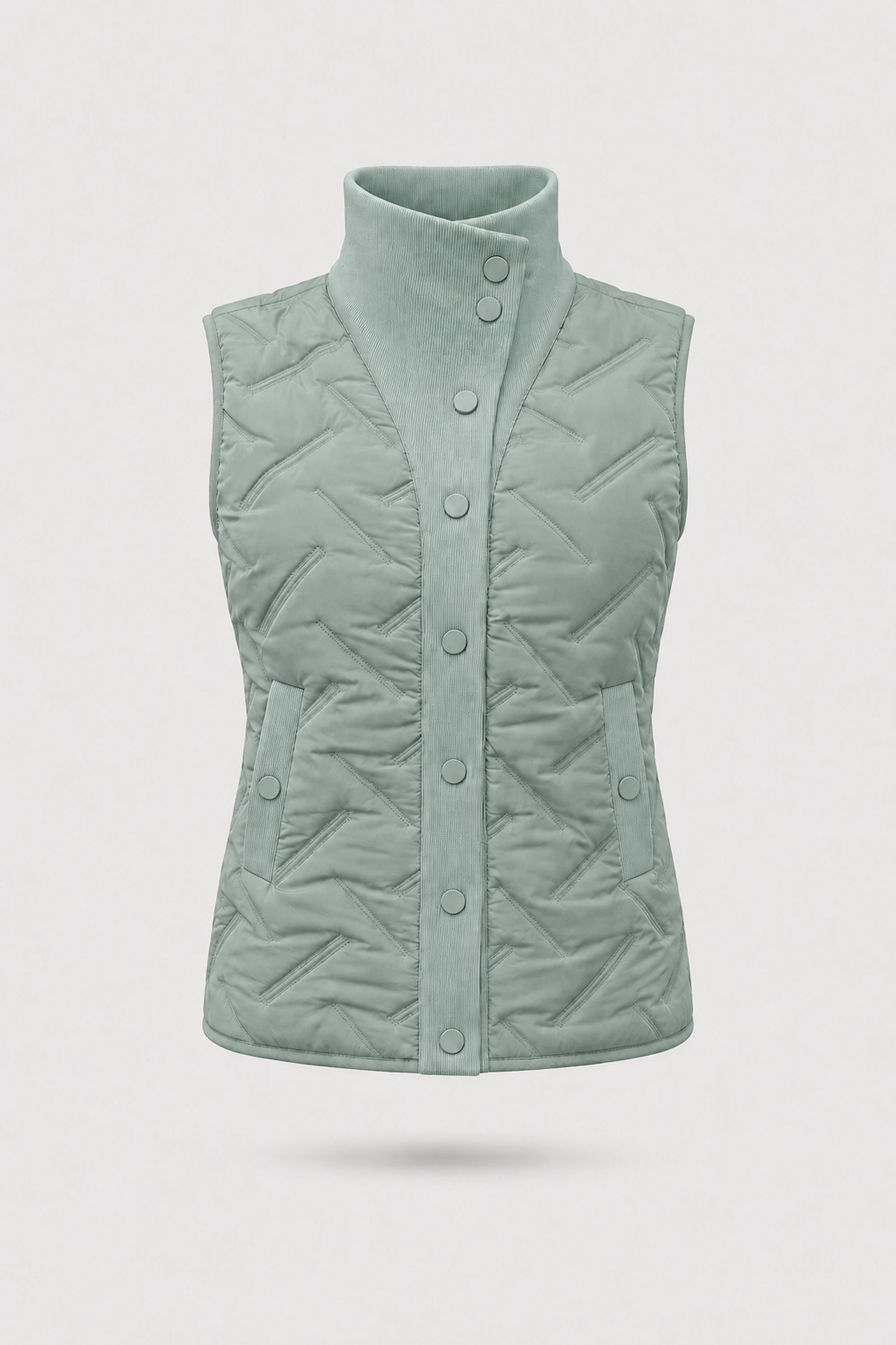 Women's Sage Grey lightweight puffer vest with quilted insulation, reversible design, and rib-knit funnel collar