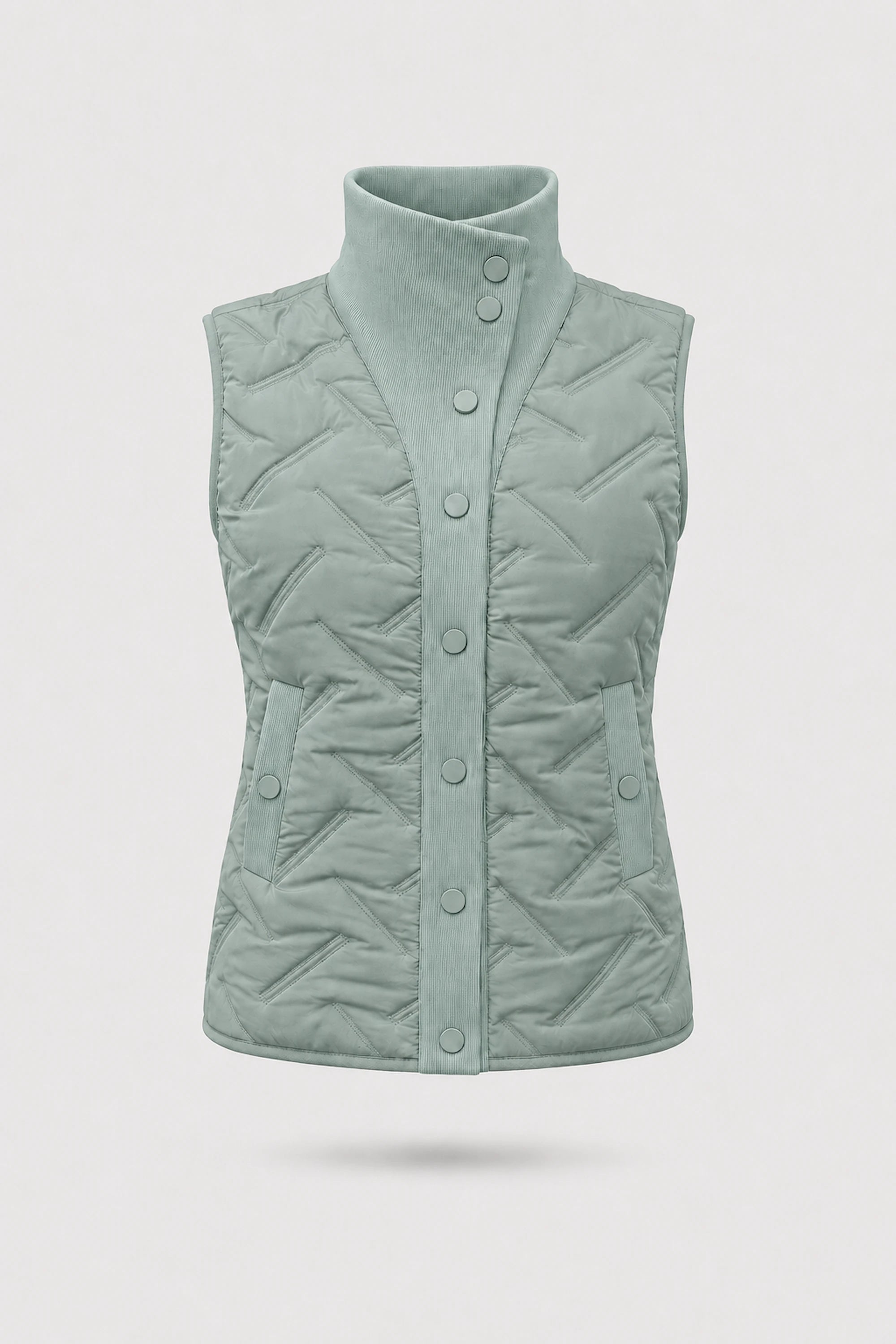 Women's Sage Grey lightweight puffer vest with quilted insulation, reversible design, and rib-knit funnel collar