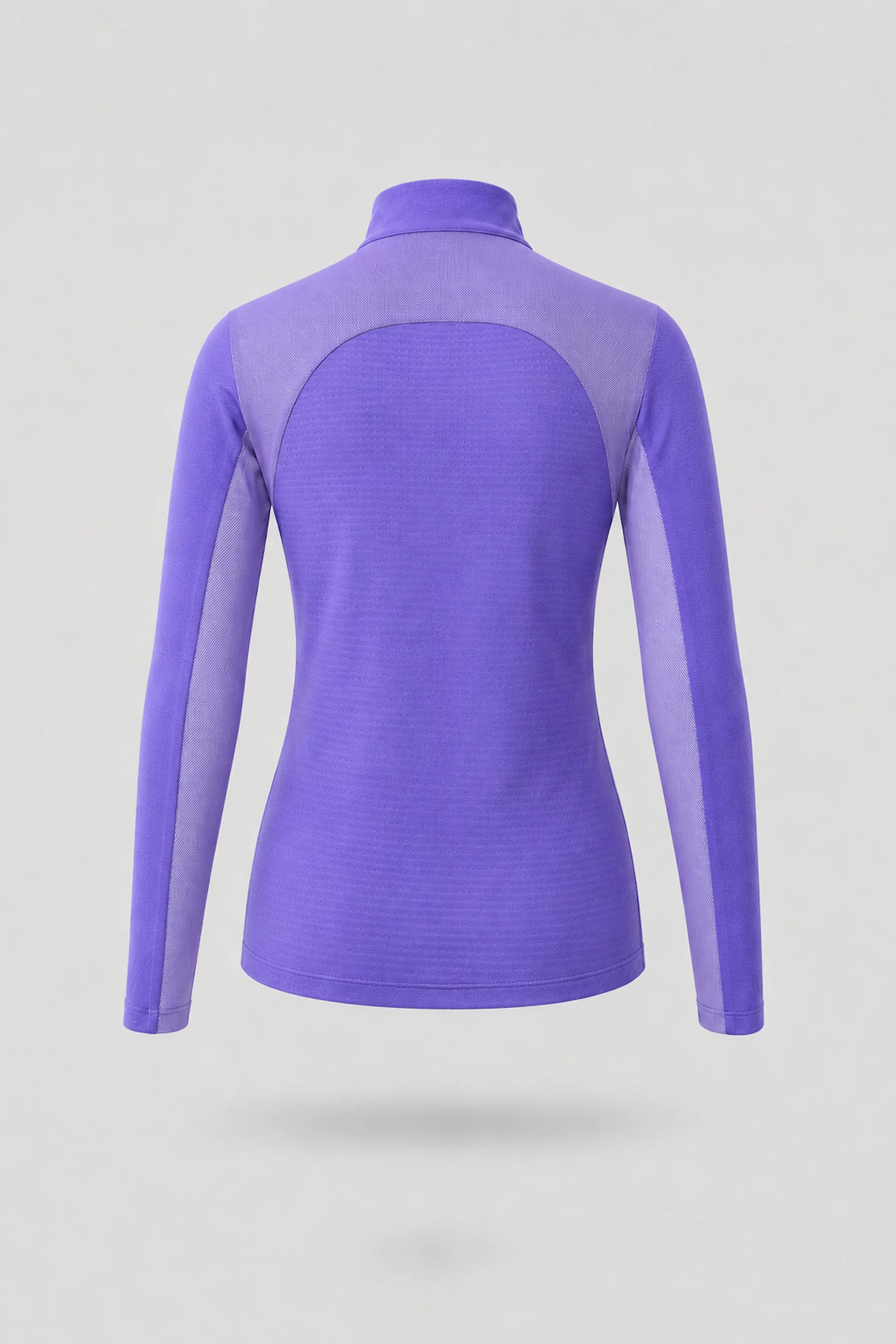 Back view of women's violet long sleeve golf top with athletic silhouette and stretch performance fabric