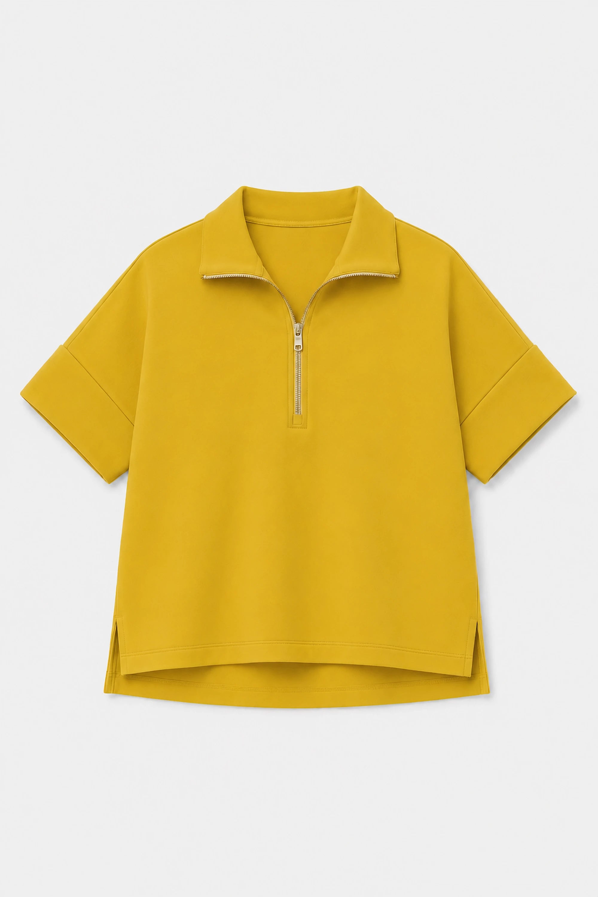 Front flat lay of women’s marigold performance quarter-zip top with relaxed silhouette
