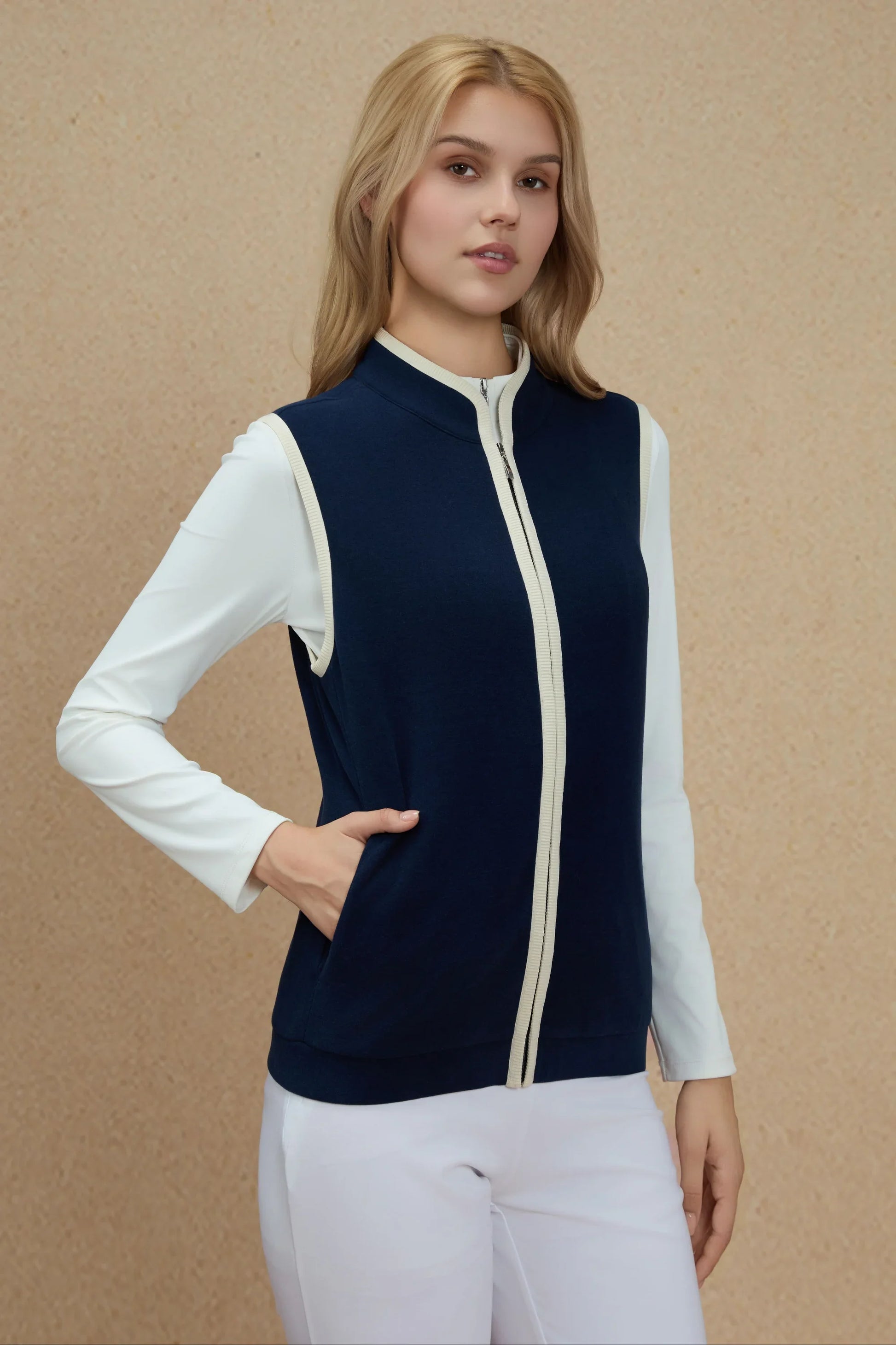 Side view of Women’s Midnight Navy golf vest showing streamlined fit and front pocket