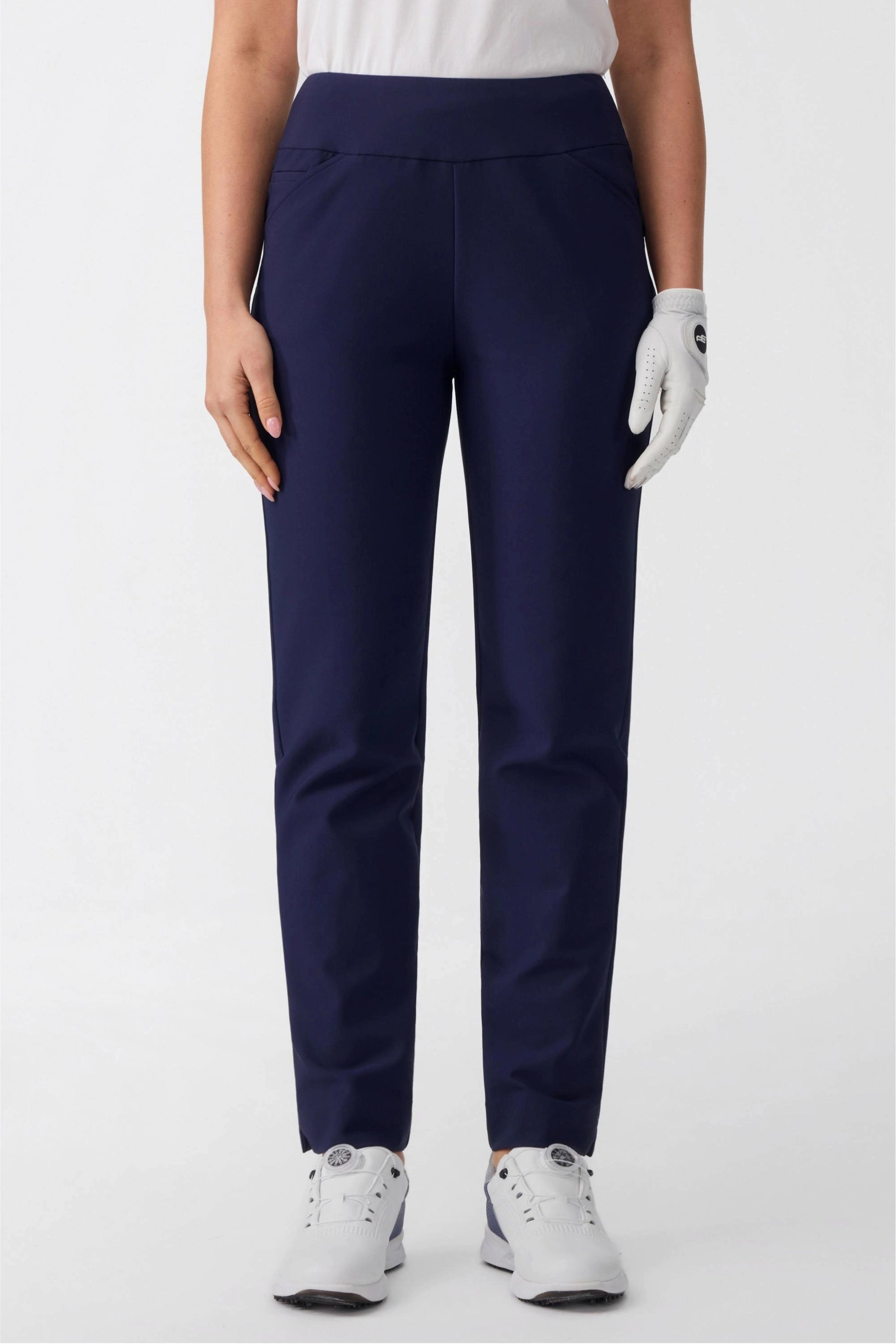 Front view of women’s midnight navy tapered golf pants with pull-on waistband