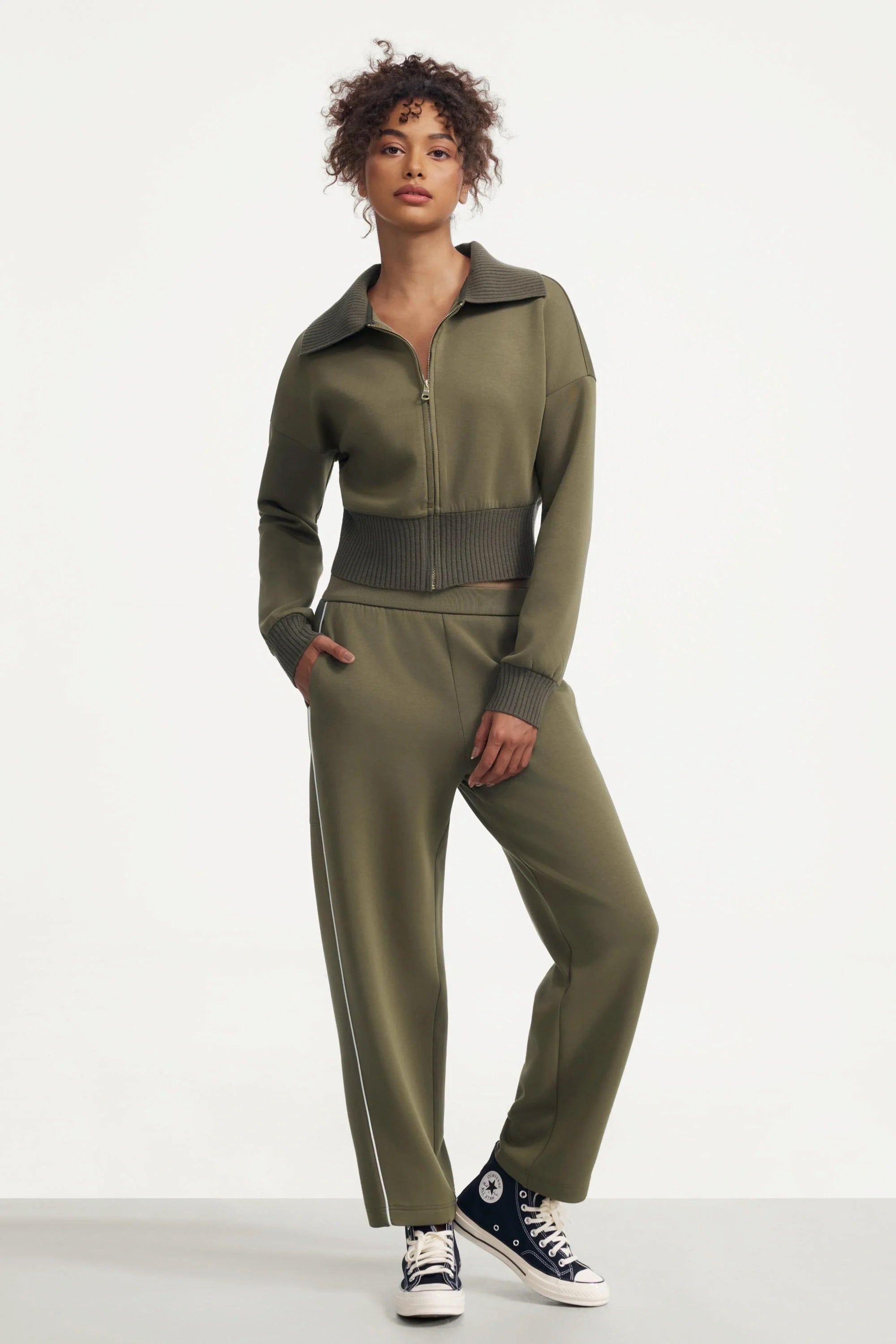 Women’s olive taupe cropped knit zip jacket styled with relaxed wide-leg pants