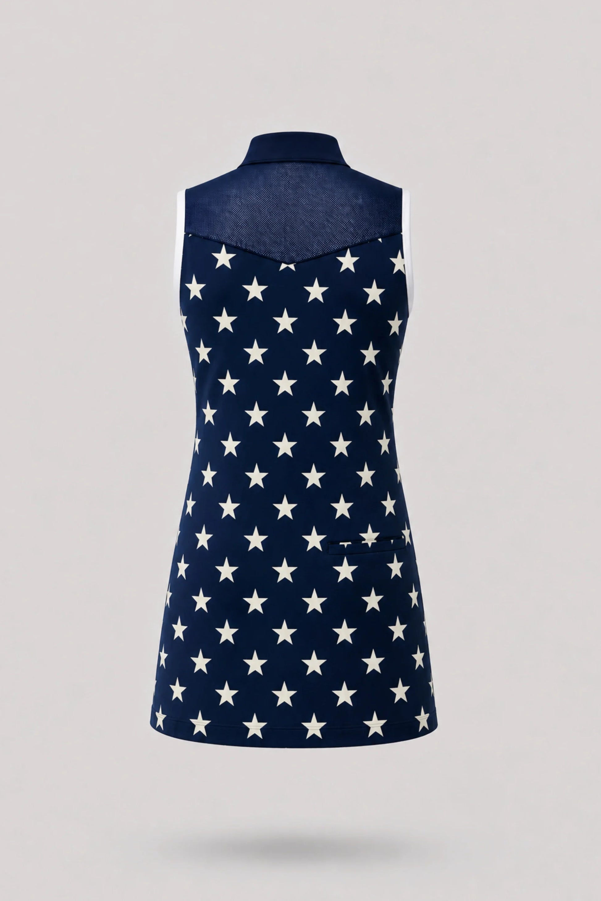 Back view of women's patterned golf dress featuring Starfield print and stretch performance fabric