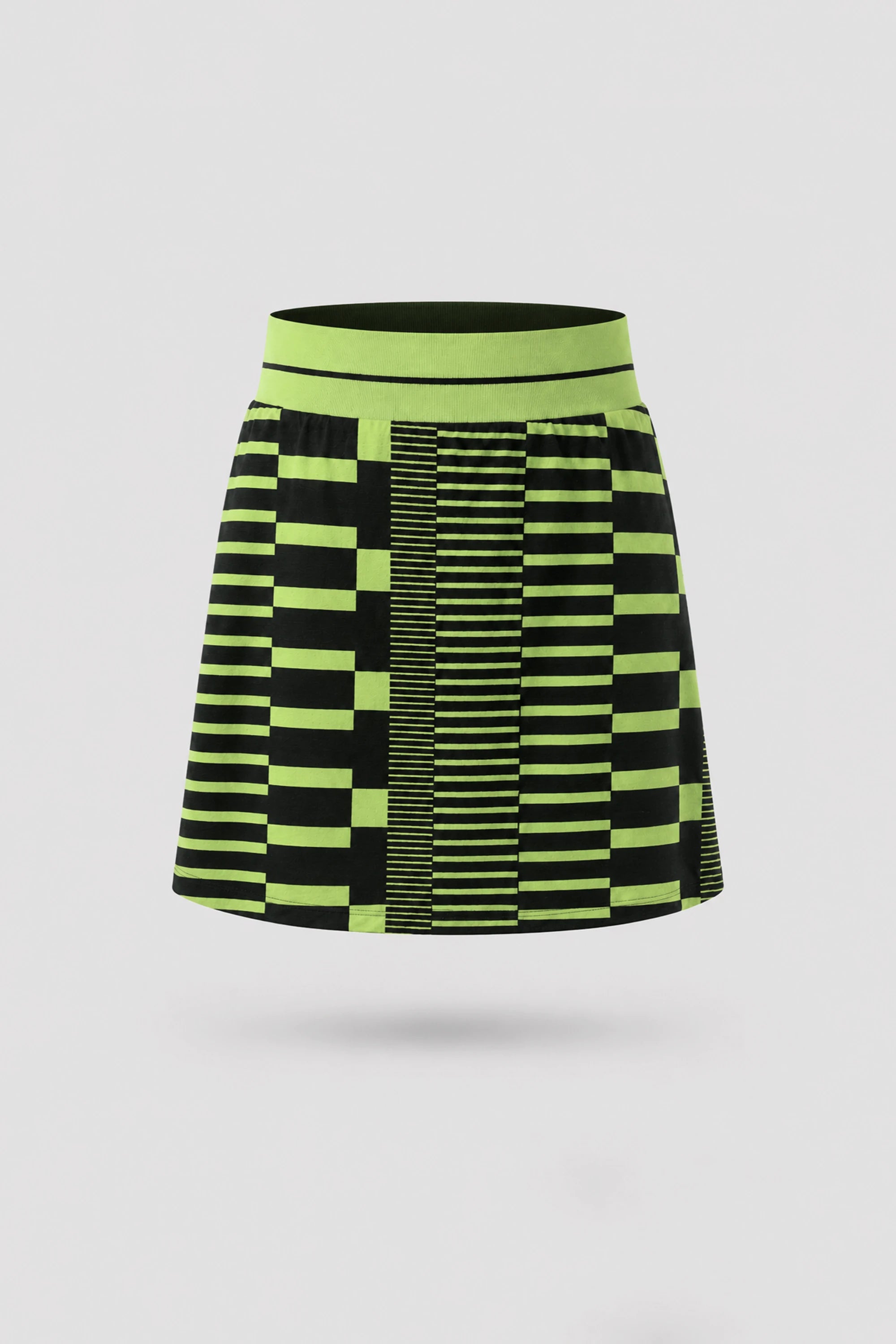 Women's patterned golf skort in Circuit Stripe design with A-line silhouette and comfortable wide waistband