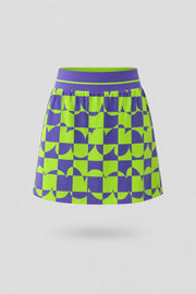 Women's geometric patterned golf skort in Paradox Geo design with A-line silhouette and wide waistband