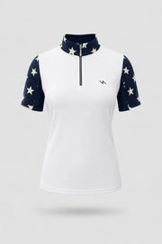 Women's patterned golf top in Starfield print with zip neck design and contrast panel detailing