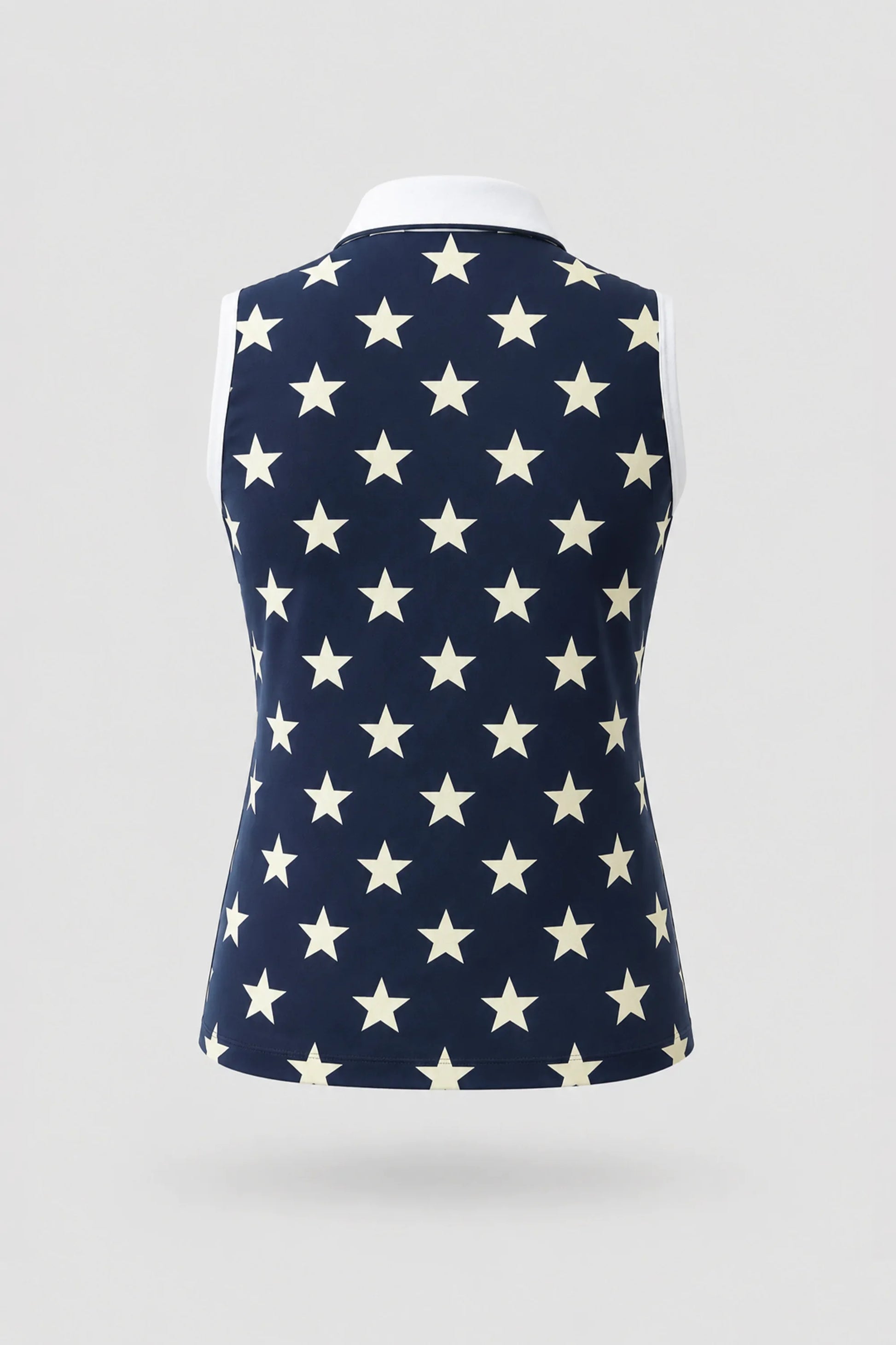 Back view of women's patterned sleeveless golf polo featuring Starfield print and athletic fit