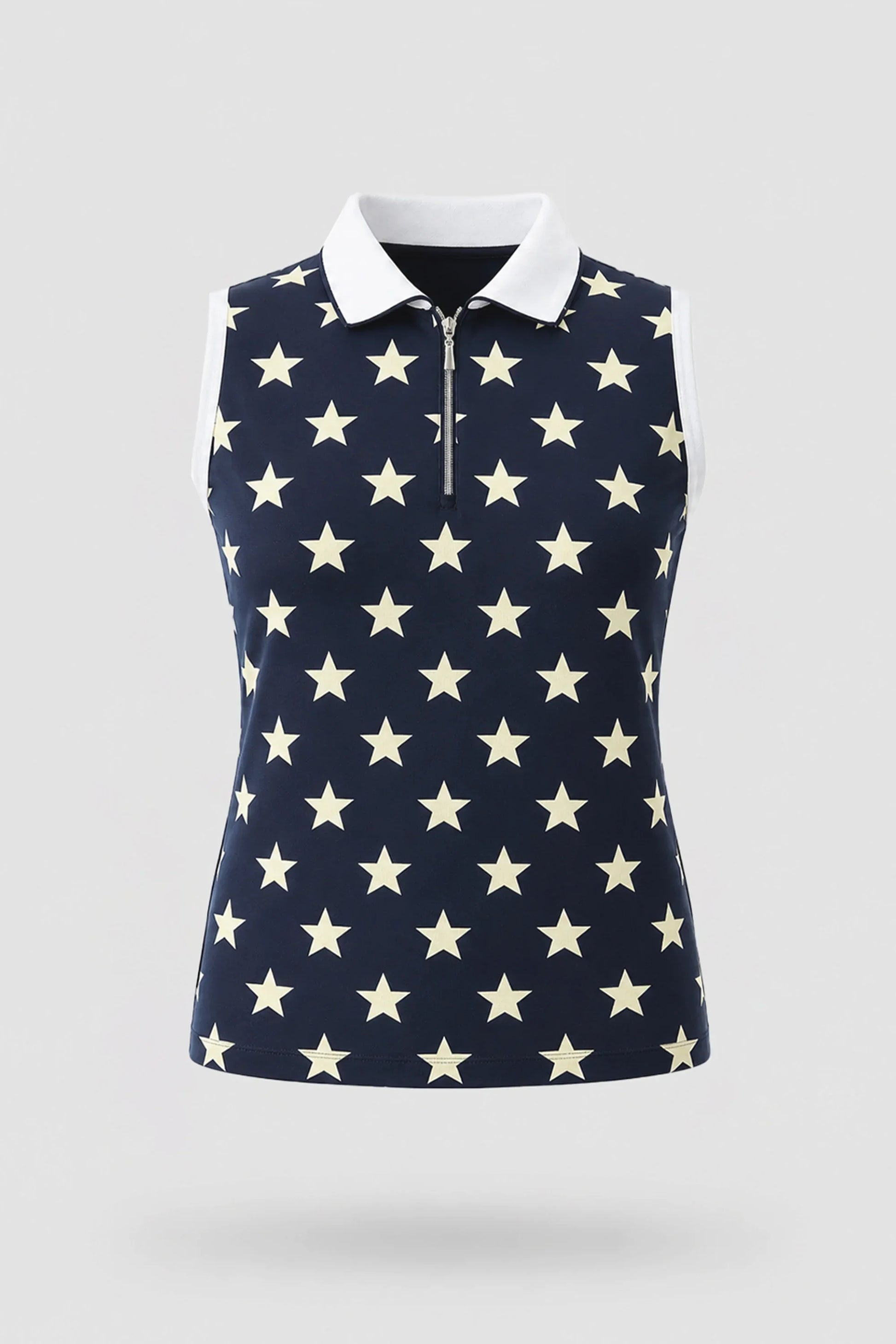 Women's patterned sleeveless golf polo in Starfield print with zip neck collar and lightweight stretch fabric