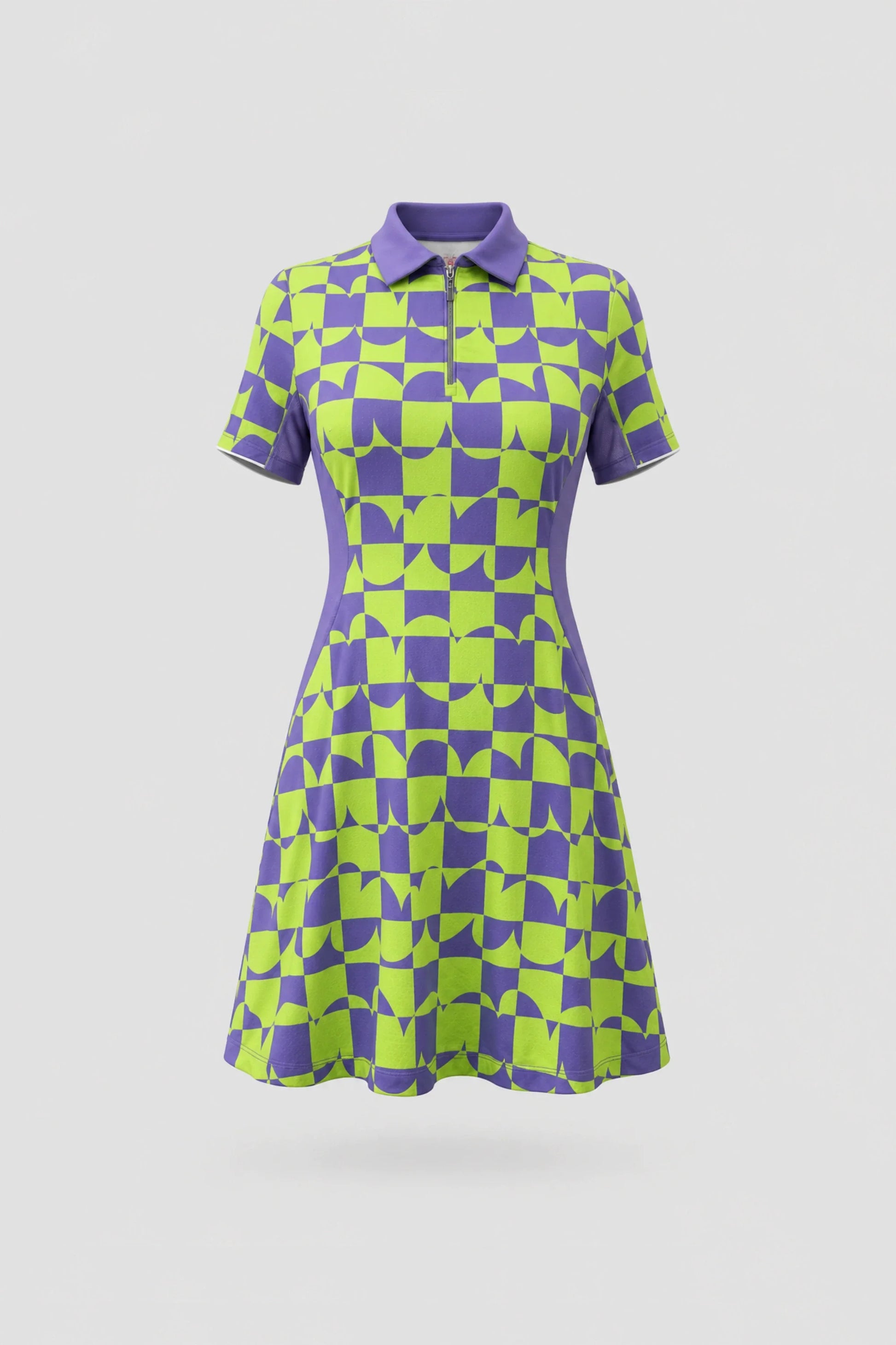 Women's patterned golf dress in Paradox Geo design with zip front collar and contoured shaping seams