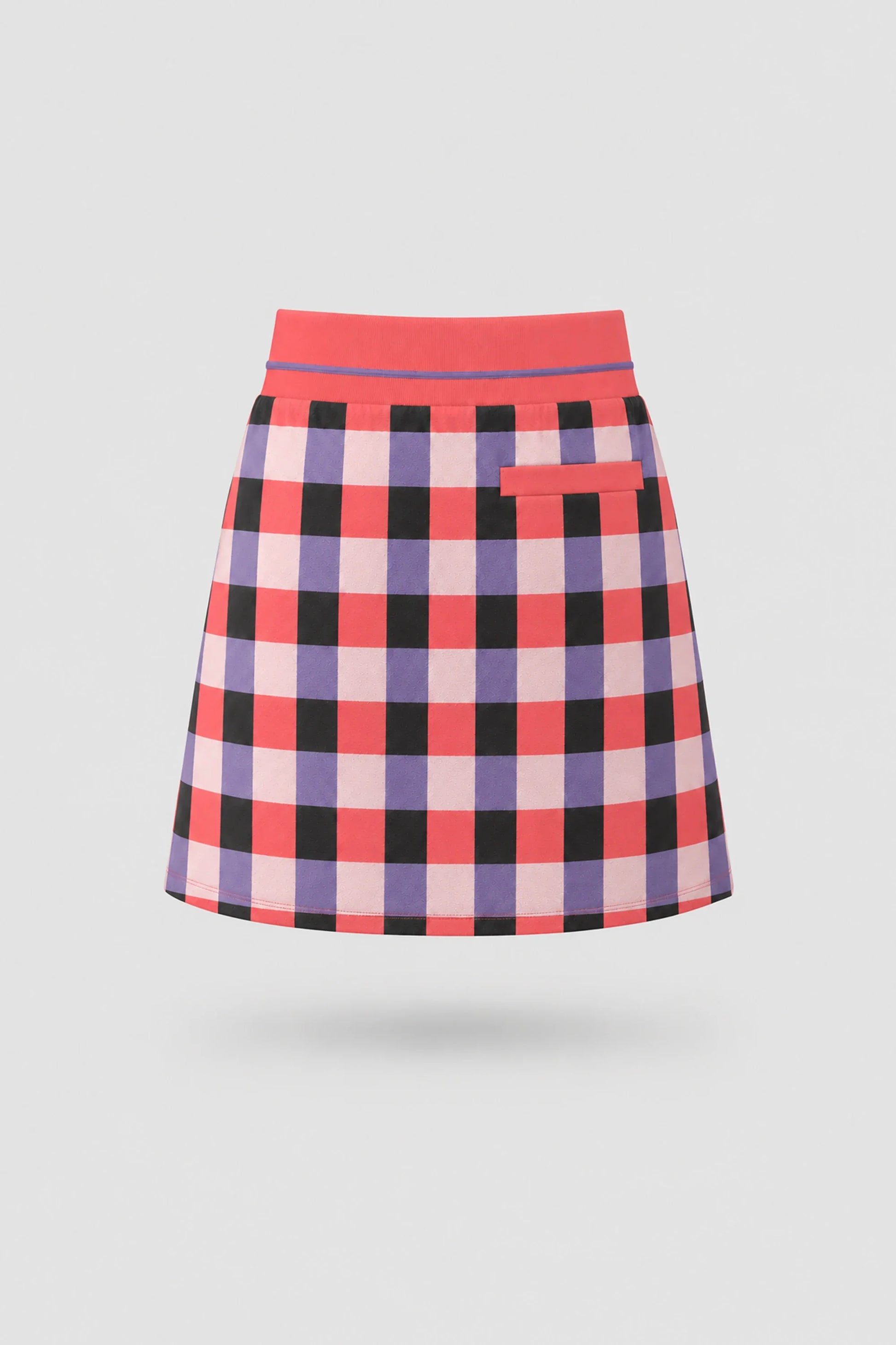 Back view of women's plaid golf skort with lightweight stretch fabric and athletic fit