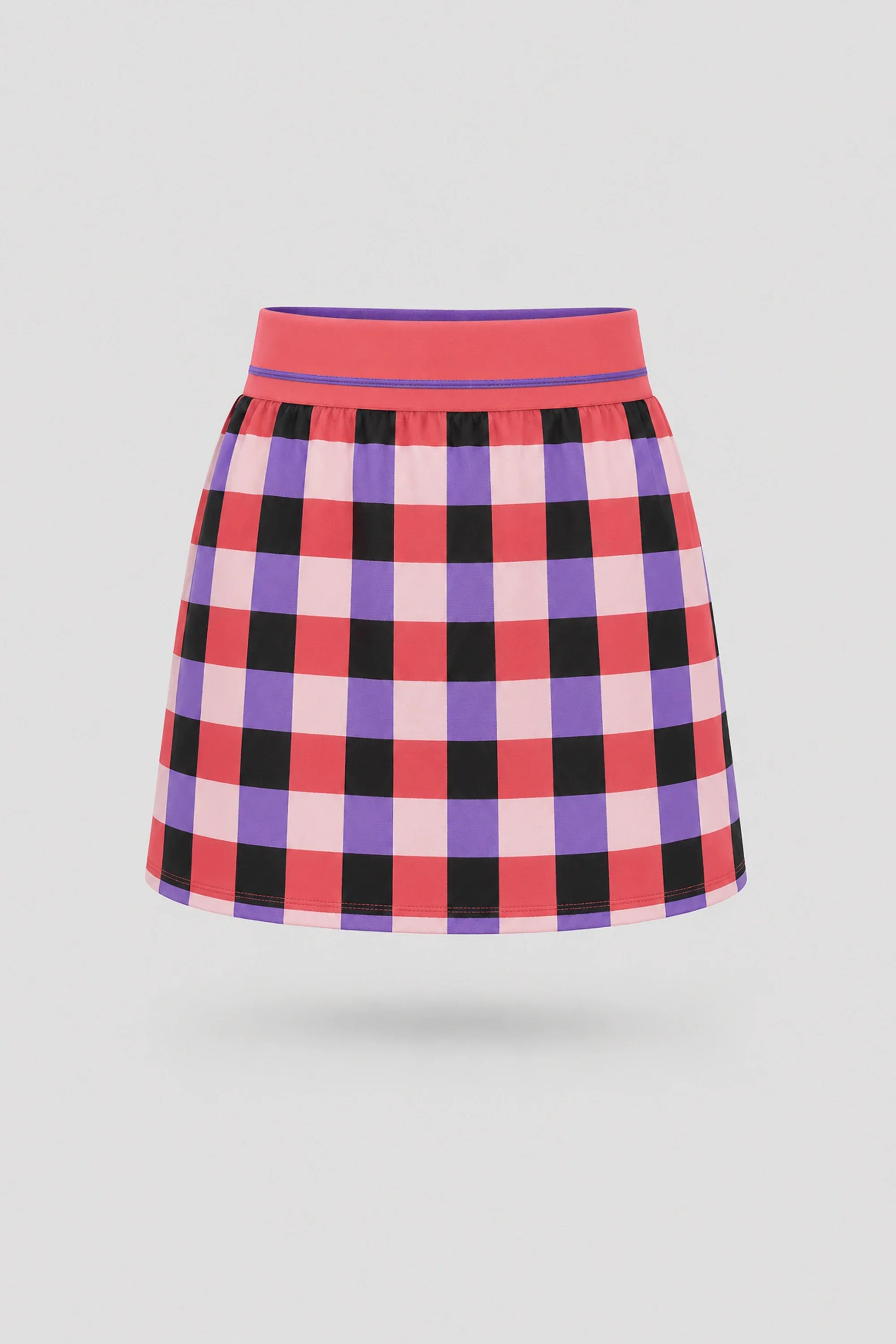 Women's plaid golf skort in Match Plaid print with A-line silhouette and wide waistband