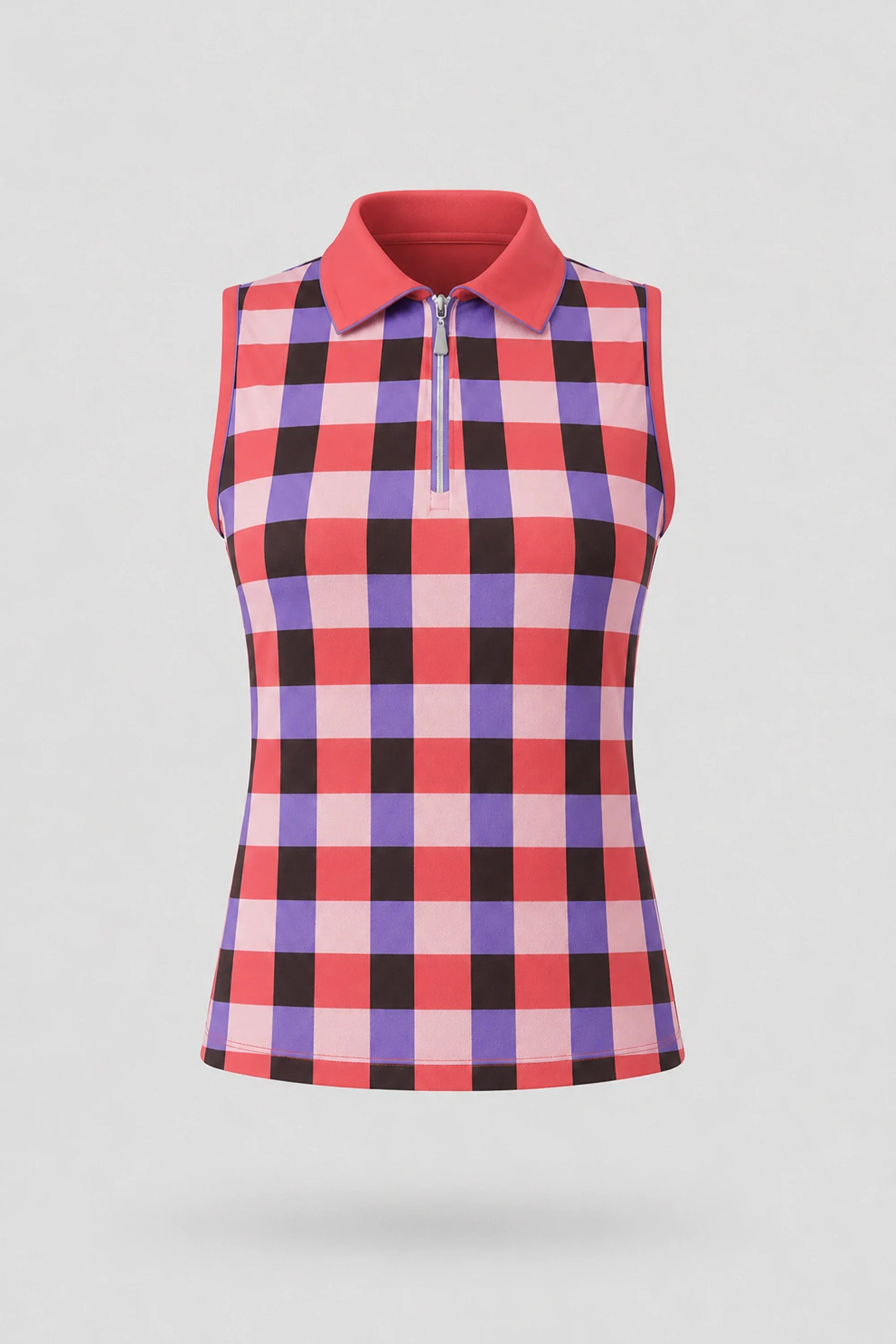 Women's sleeveless plaid golf polo in Match Plaid design with zip neck collar and athletic fit