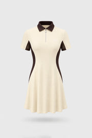 Women's Cream polo golf dress with zip-front collar, contoured shaping silhouette, and stretch performance fabric