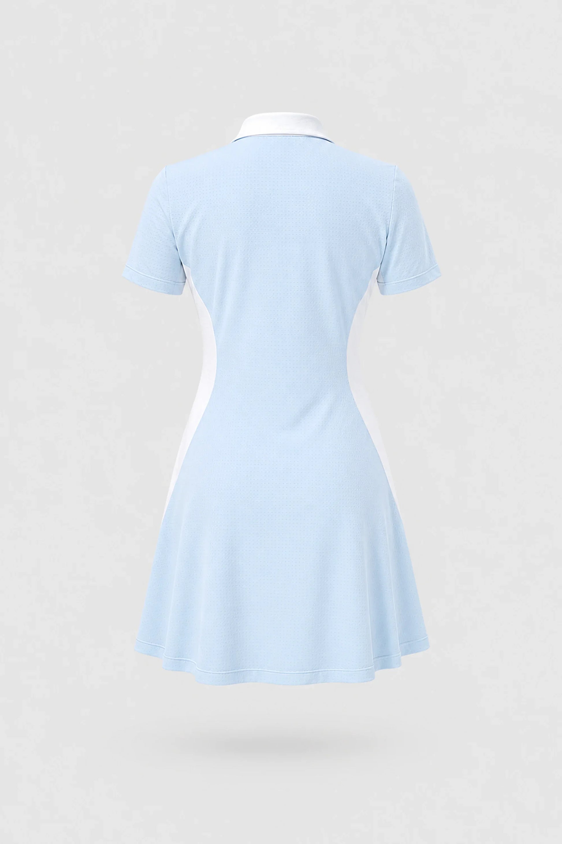 Back view of women's light blue polo golf dress with breathable mesh sleeve panels and sculpted fit