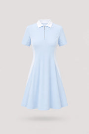 Women's light blue polo golf dress with zip front collar and contour seam detailing