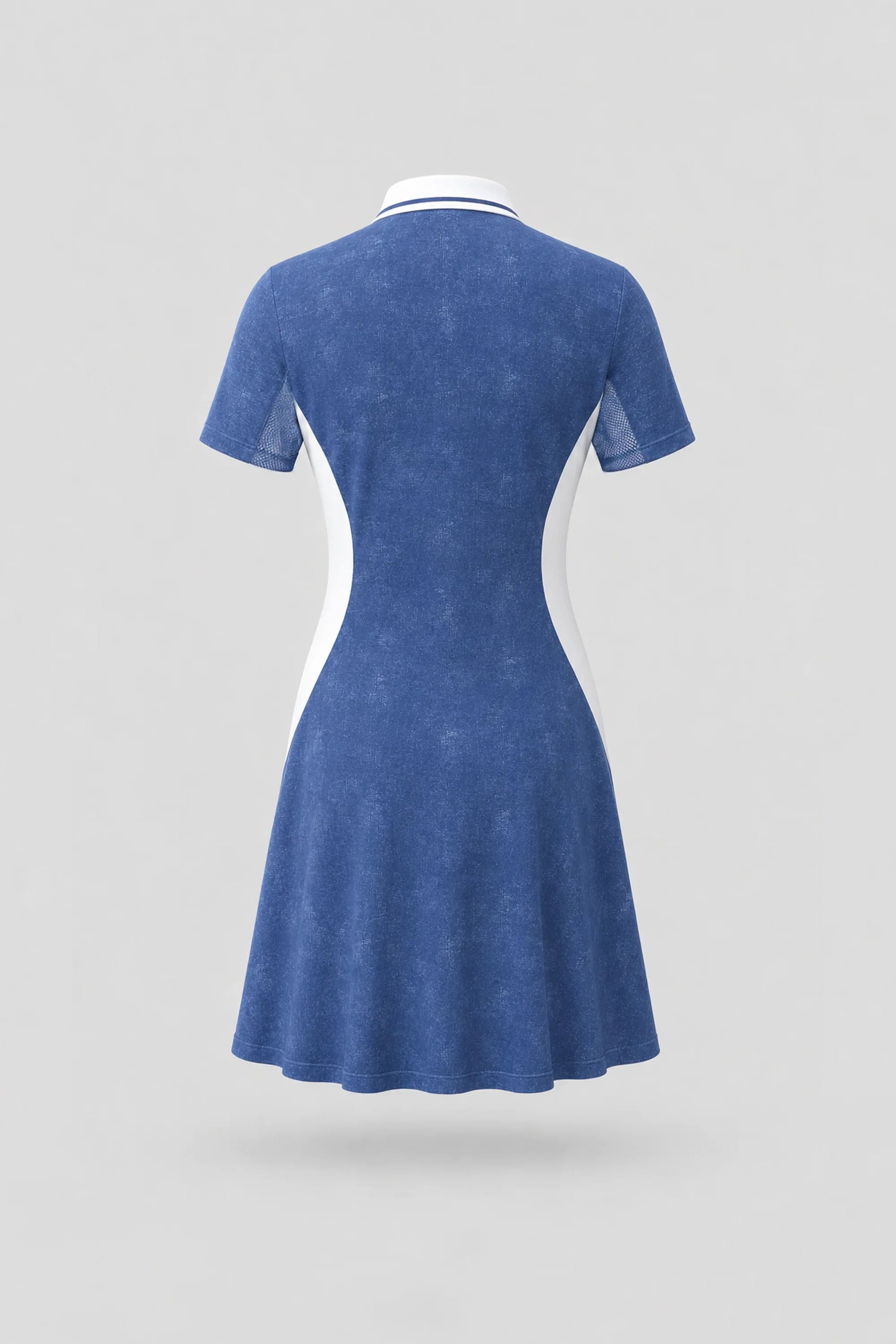 Back view of women's vintage blue polo golf dress with breathable mesh sleeve panels and athletic silhouette