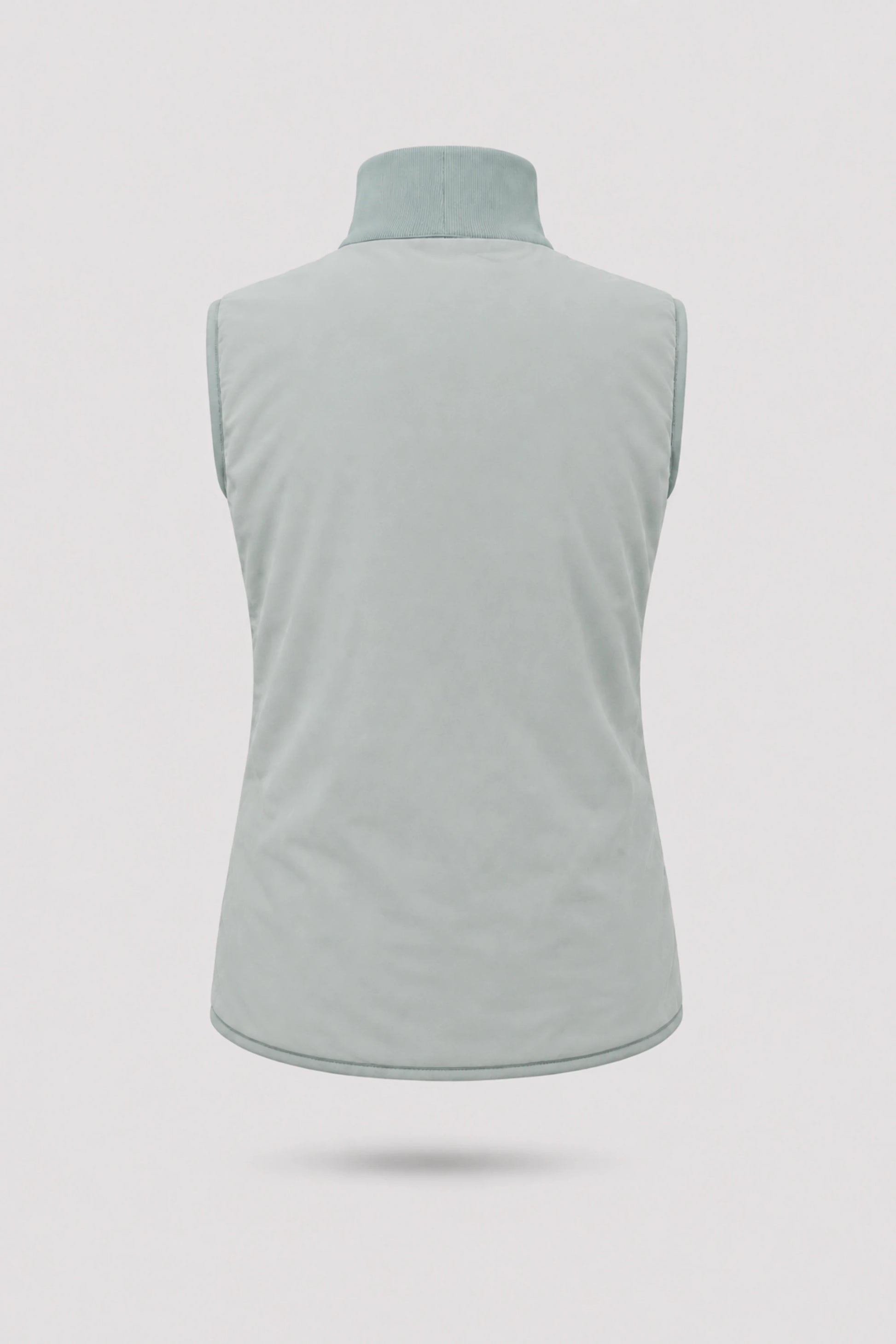 Back view of women's reversible Sage Grey puffer vest showing clean reverse finish and lightweight insulated construction