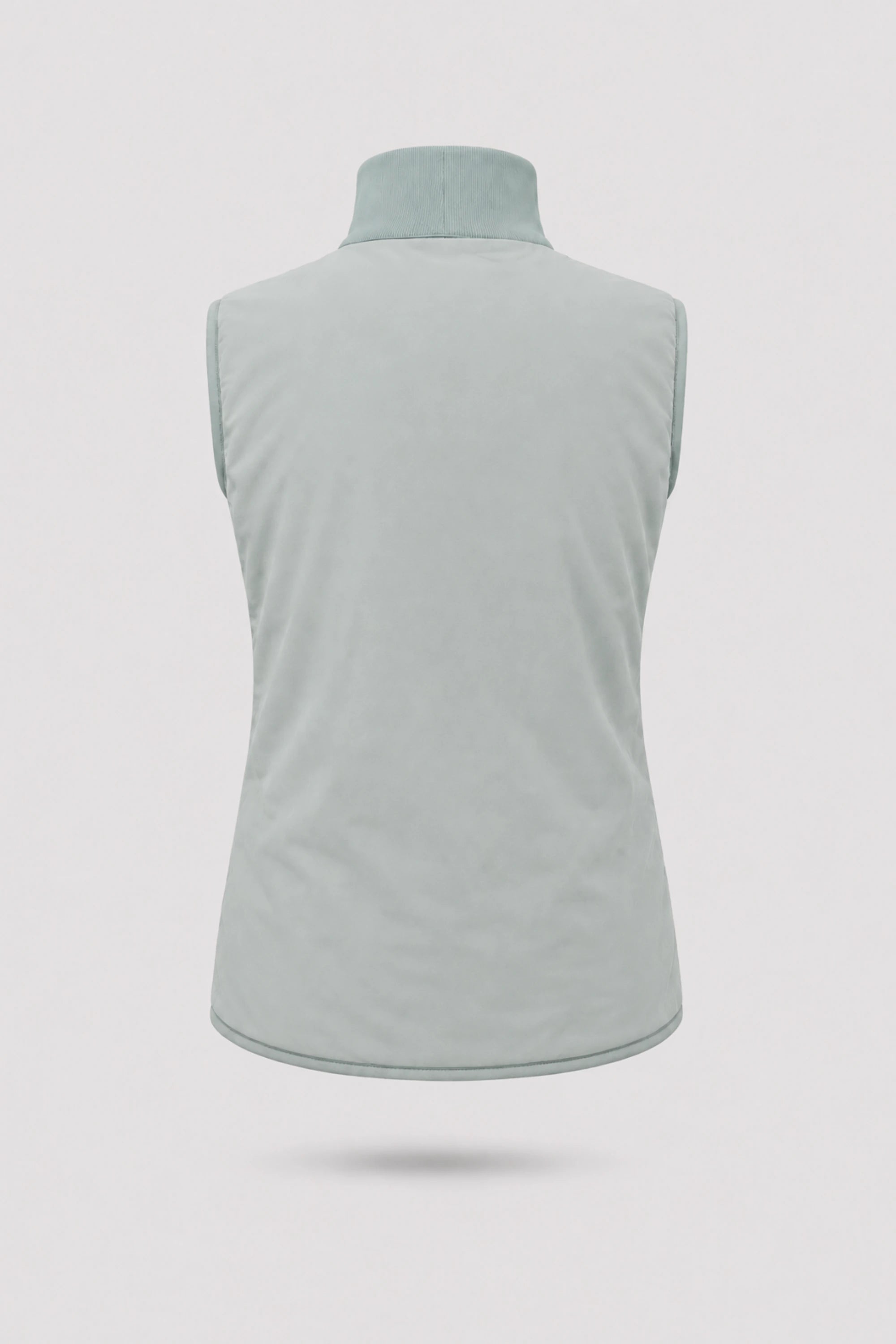 Back view of women's reversible Sage Grey puffer vest showing clean reverse finish and lightweight insulated construction