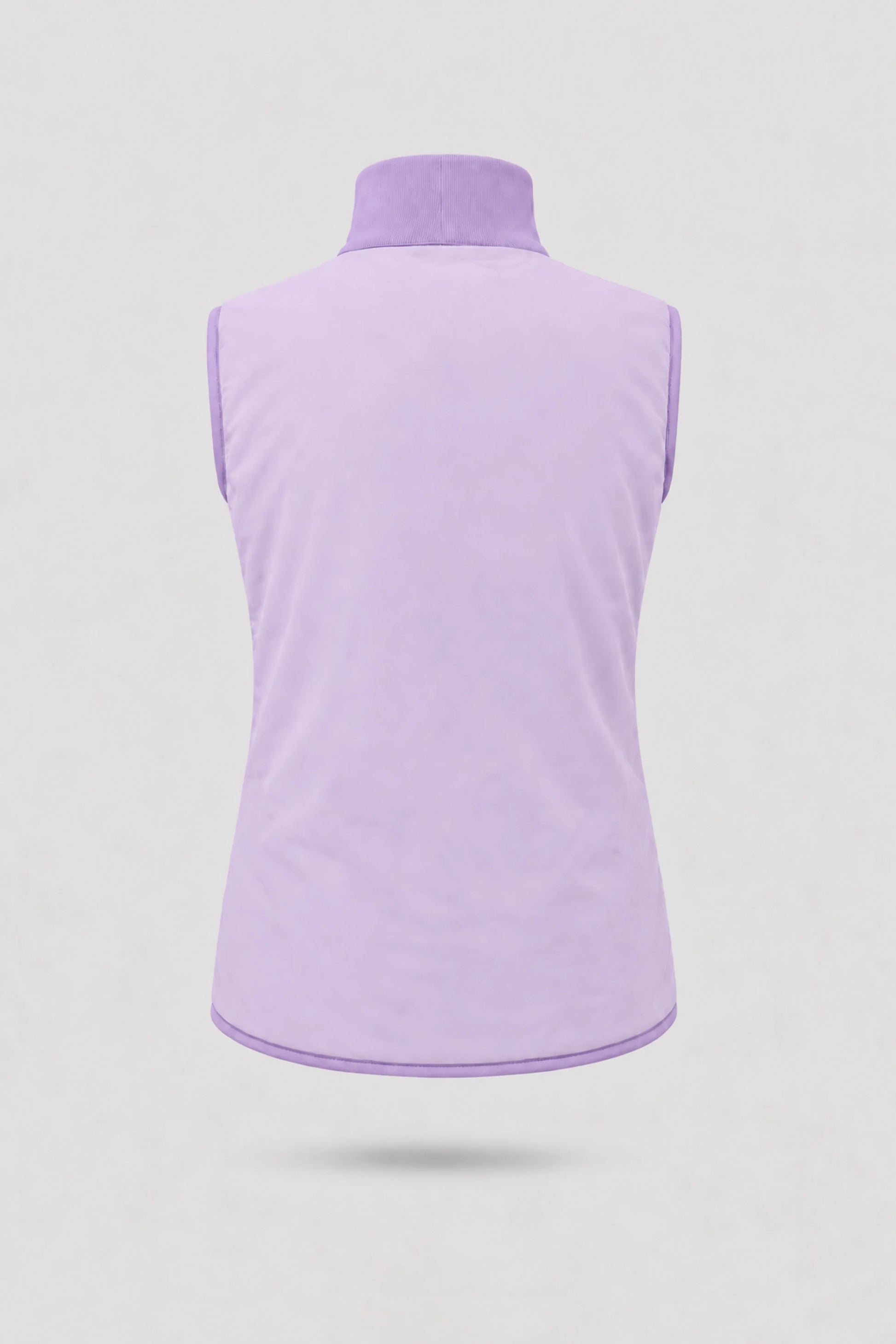 Back view of women's reversible lavender puffer vest showing clean reverse finish and lightweight insulated construction