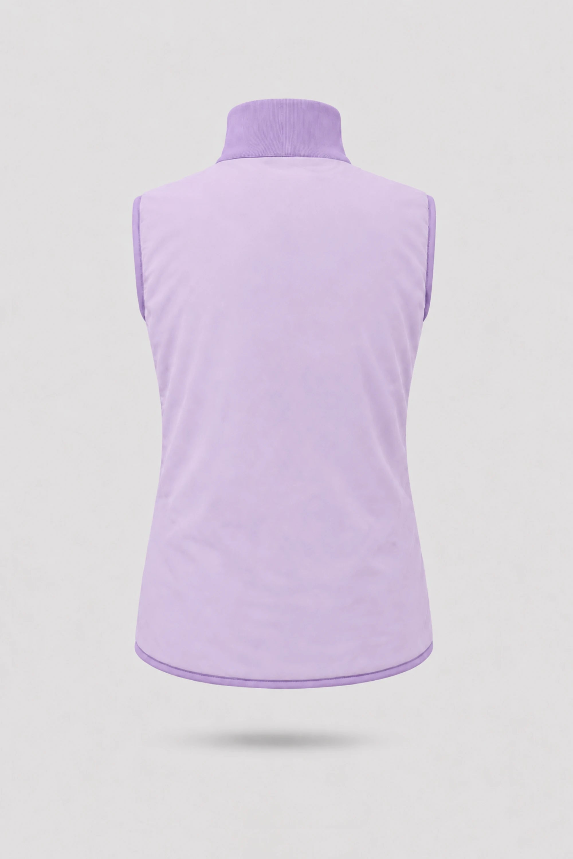Back view of women's reversible lavender puffer vest showing clean reverse finish and lightweight insulated construction