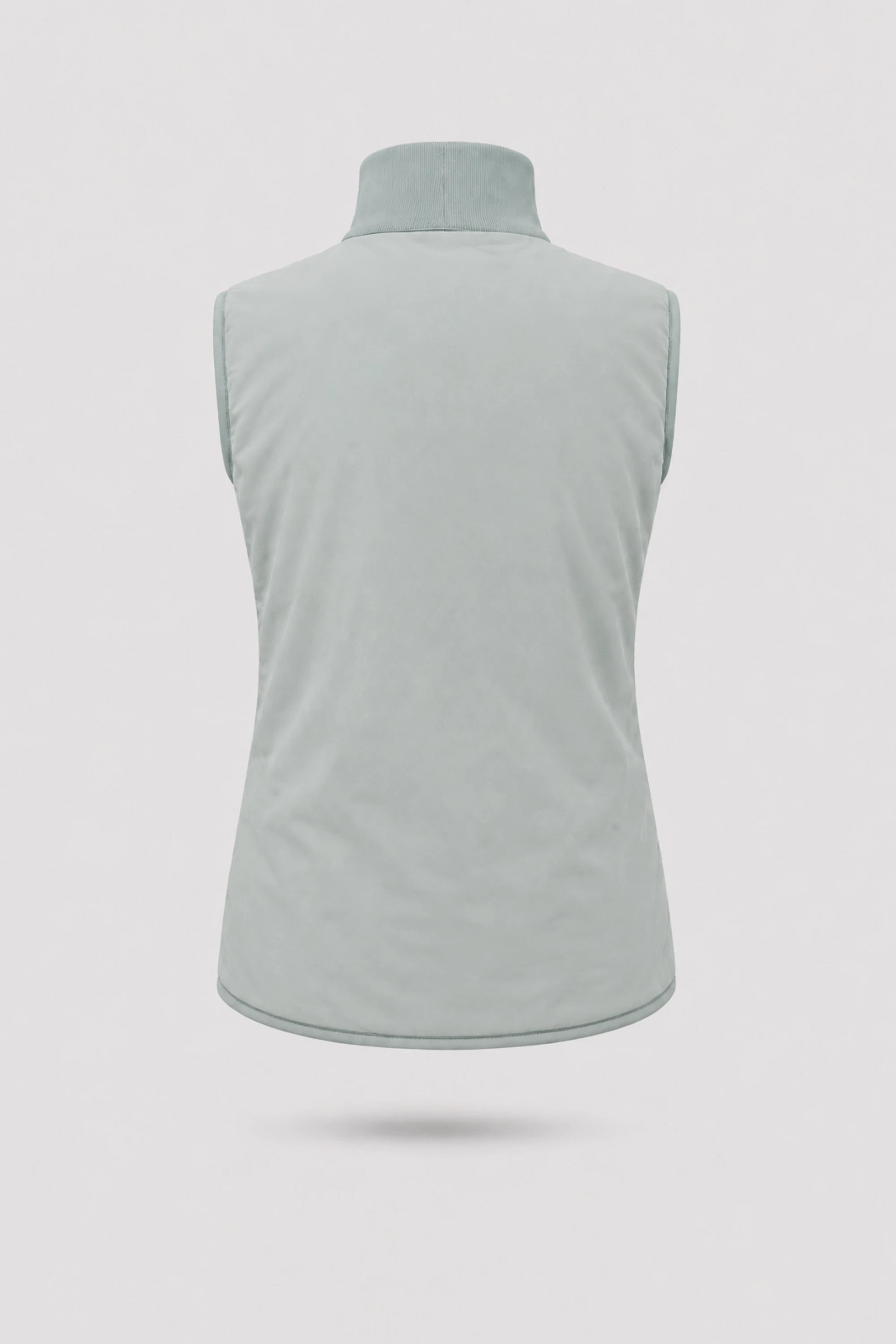 Back view of women's reversible Sage Grey puffer vest showing clean reverse finish and lightweight insulated construction
