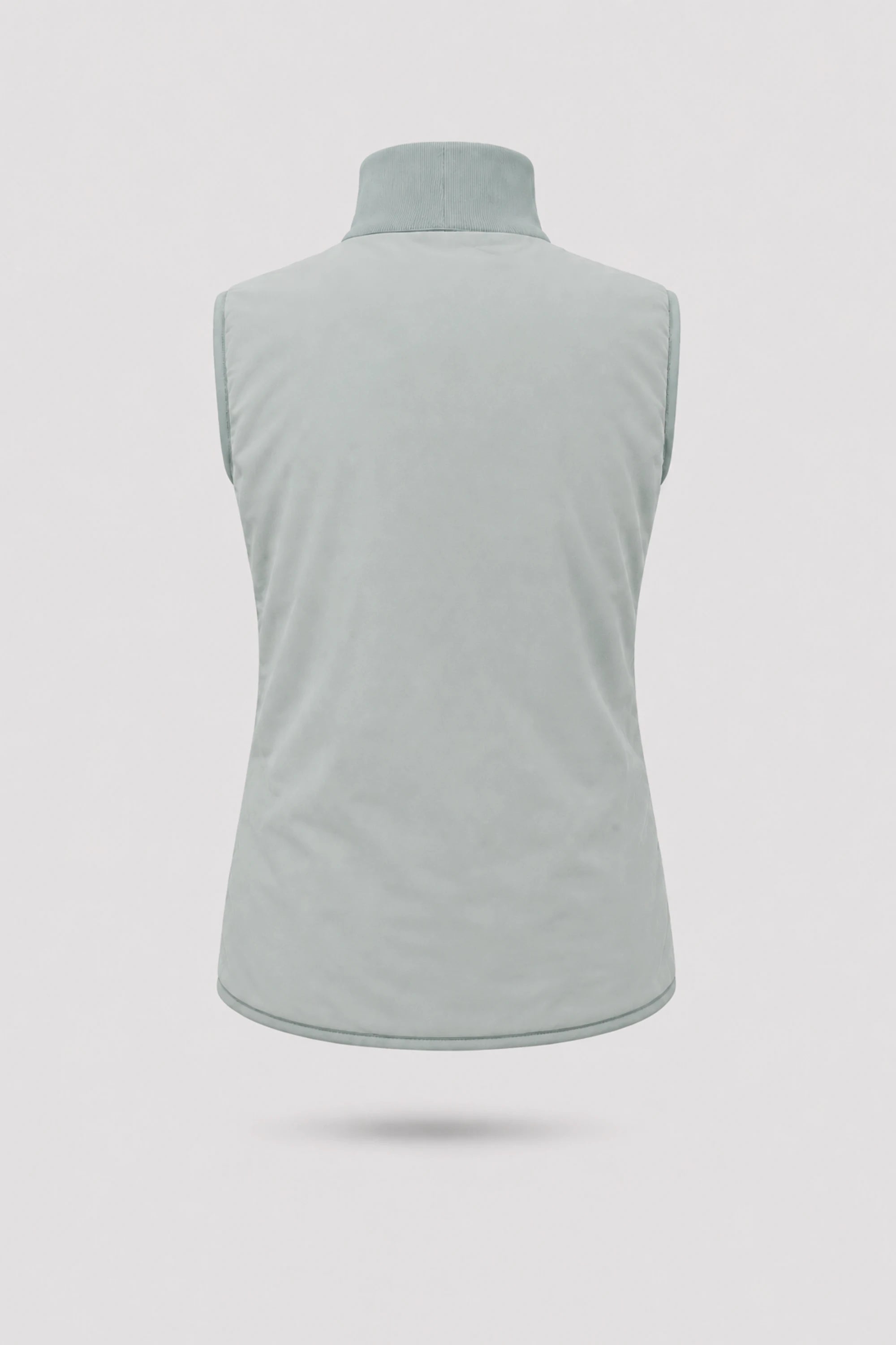 Back view of women's reversible Sage Grey puffer vest showing clean reverse finish and lightweight insulated construction