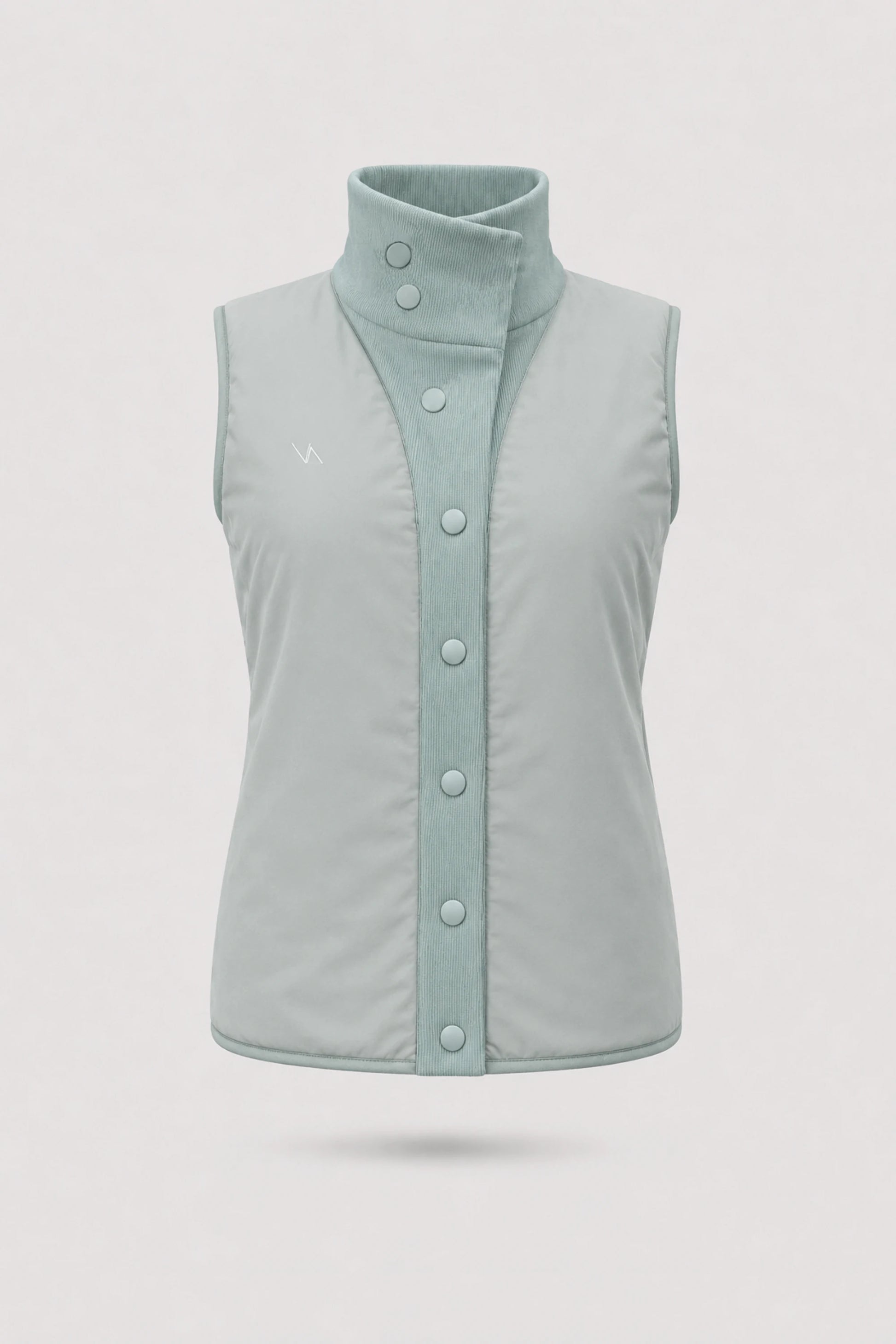 Women's reversible puffer vest in Sage Grey with smooth reverse finish, rib-knit collar, and lightweight layering design