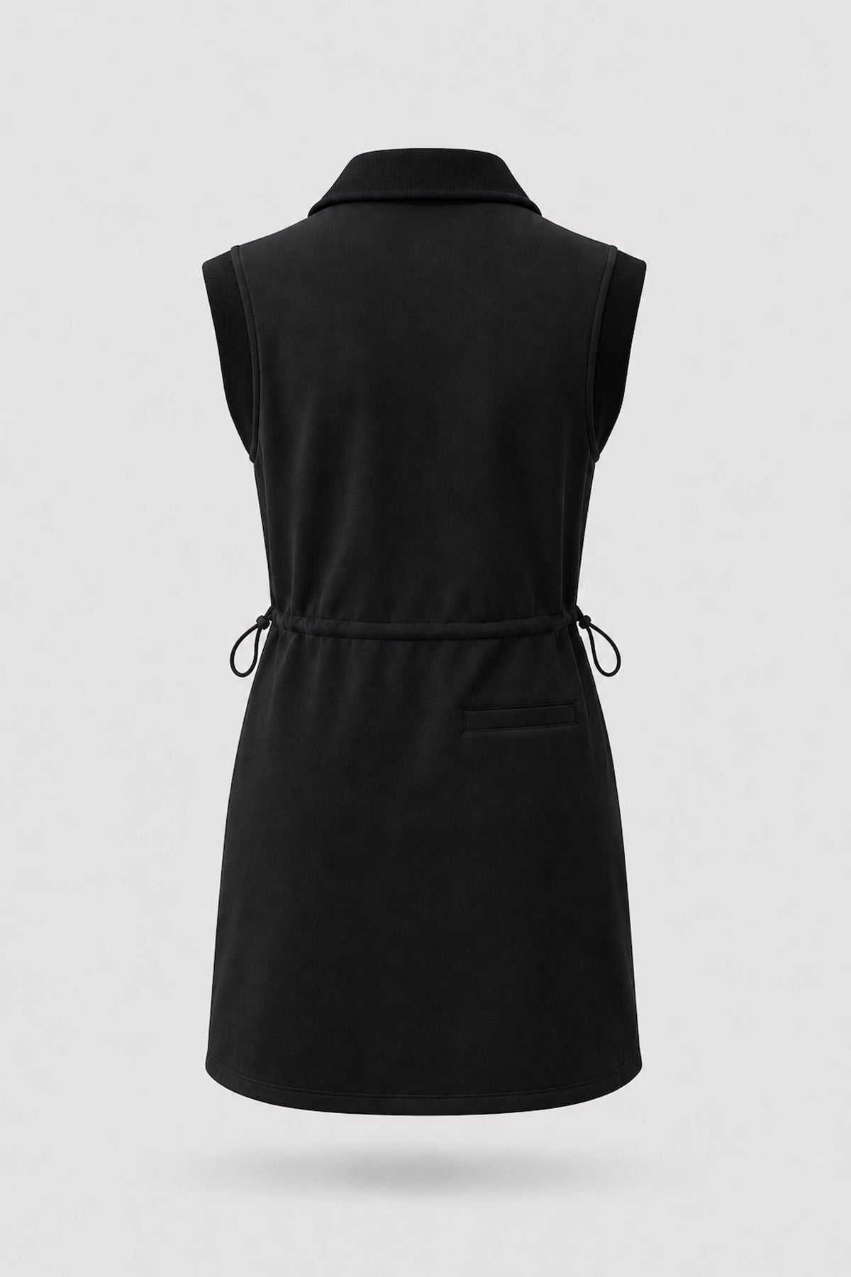 Back view of women's black sleeveless golf dress with folded collar, adjustable drawcord waist and back pocket