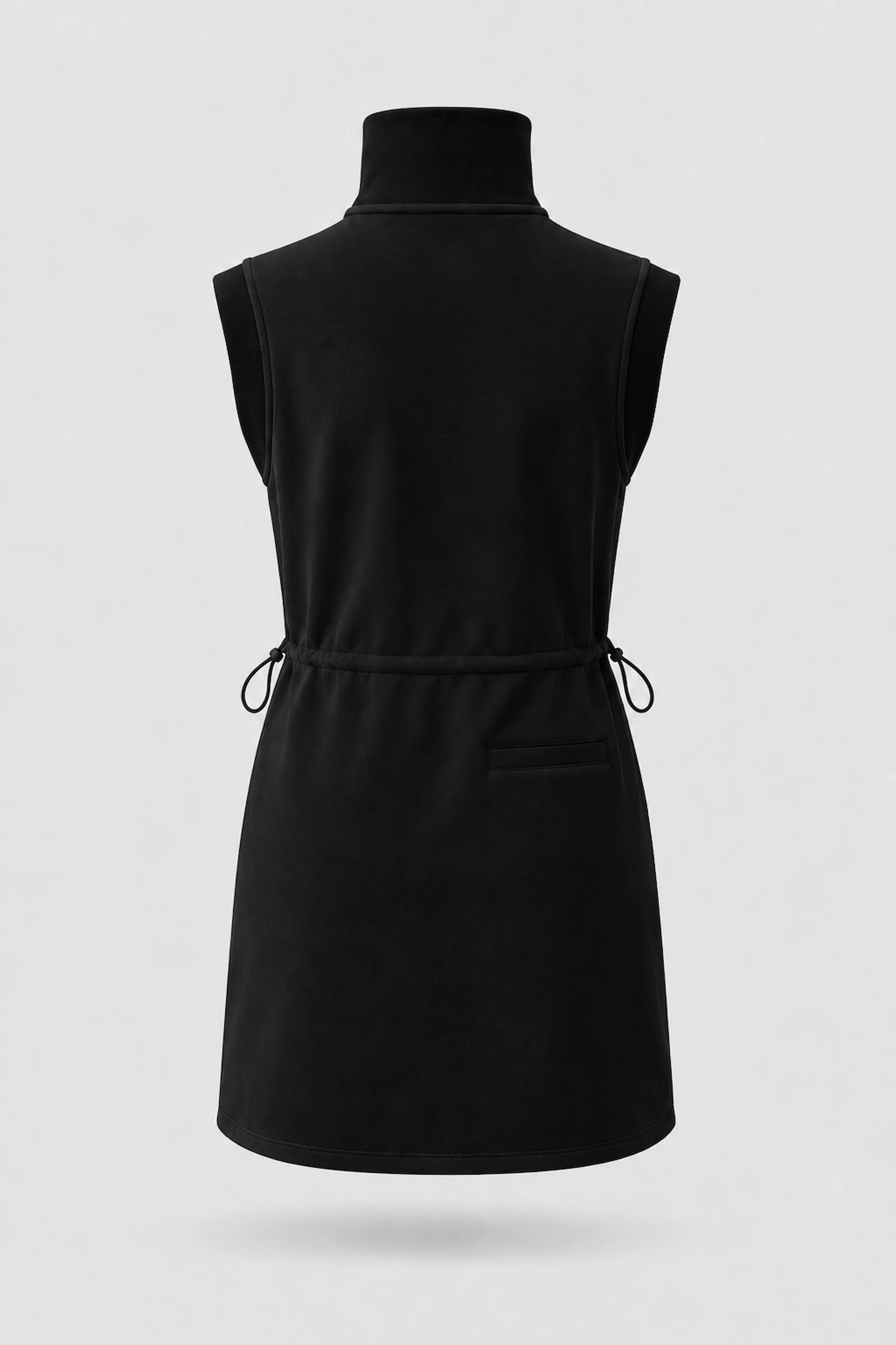 Back view of women's black sleeveless golf dress with stand collar, adjustable drawcord waist and back pocket