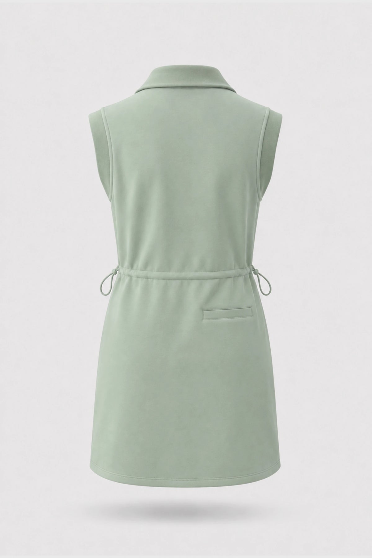 Back view of women's sage green sleeveless golf dress with folded collar and adjustable drawcord waist