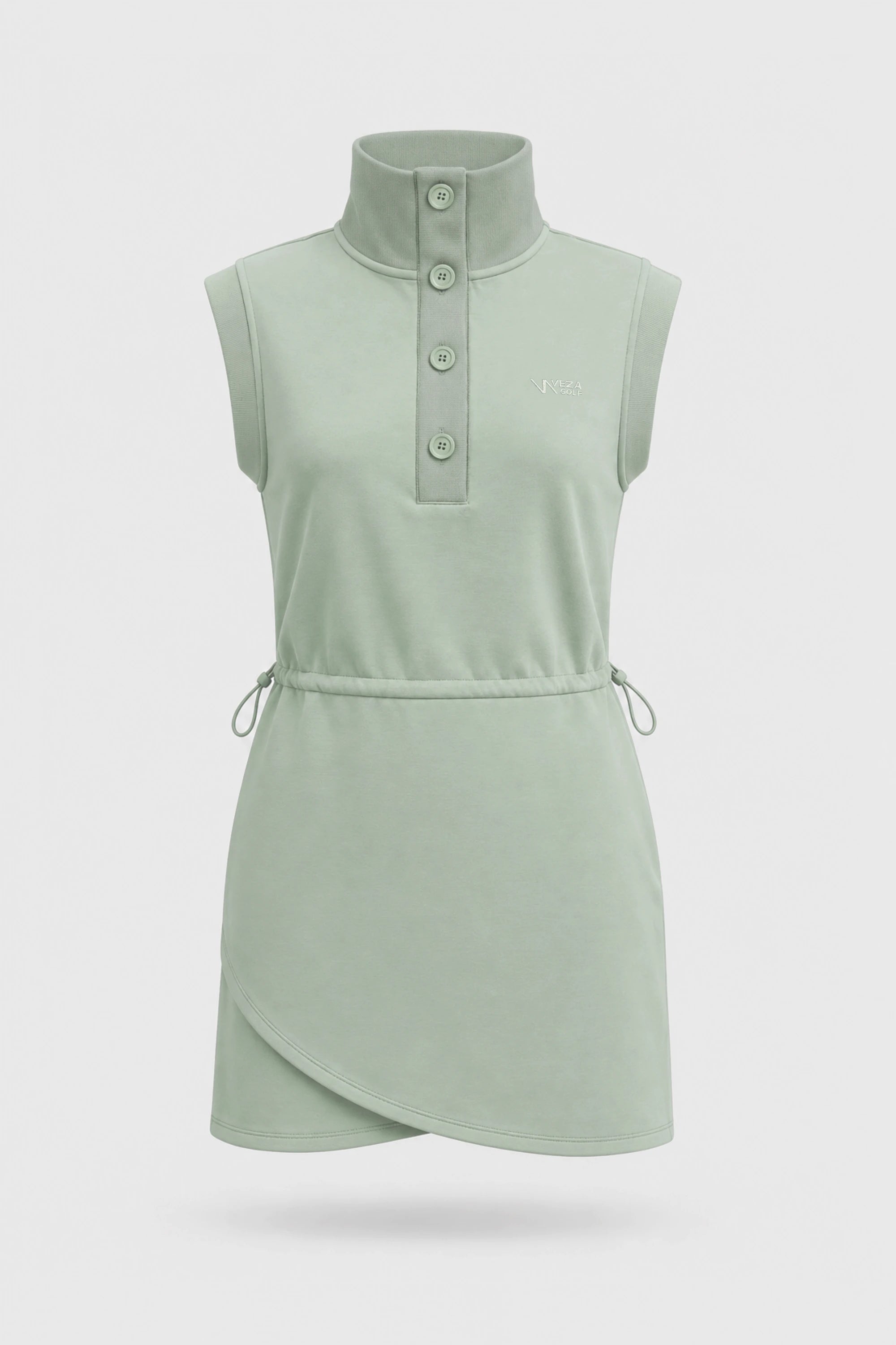 Front view of women's sage green sleeveless golf dress with buttoned stand collar, drawcord waist and asymmetric wrap hem