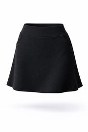 Front 3D view of women’s black smooth A-line golf skort 17 inch with high-rise waistband and side pockets