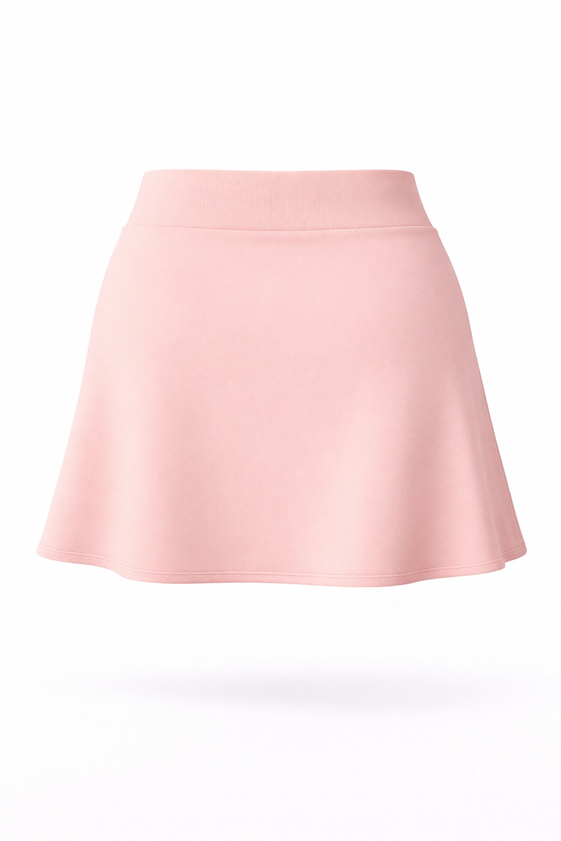 Back view of women’s soft pink A-line UPF 50+ golf skort with smooth waistband