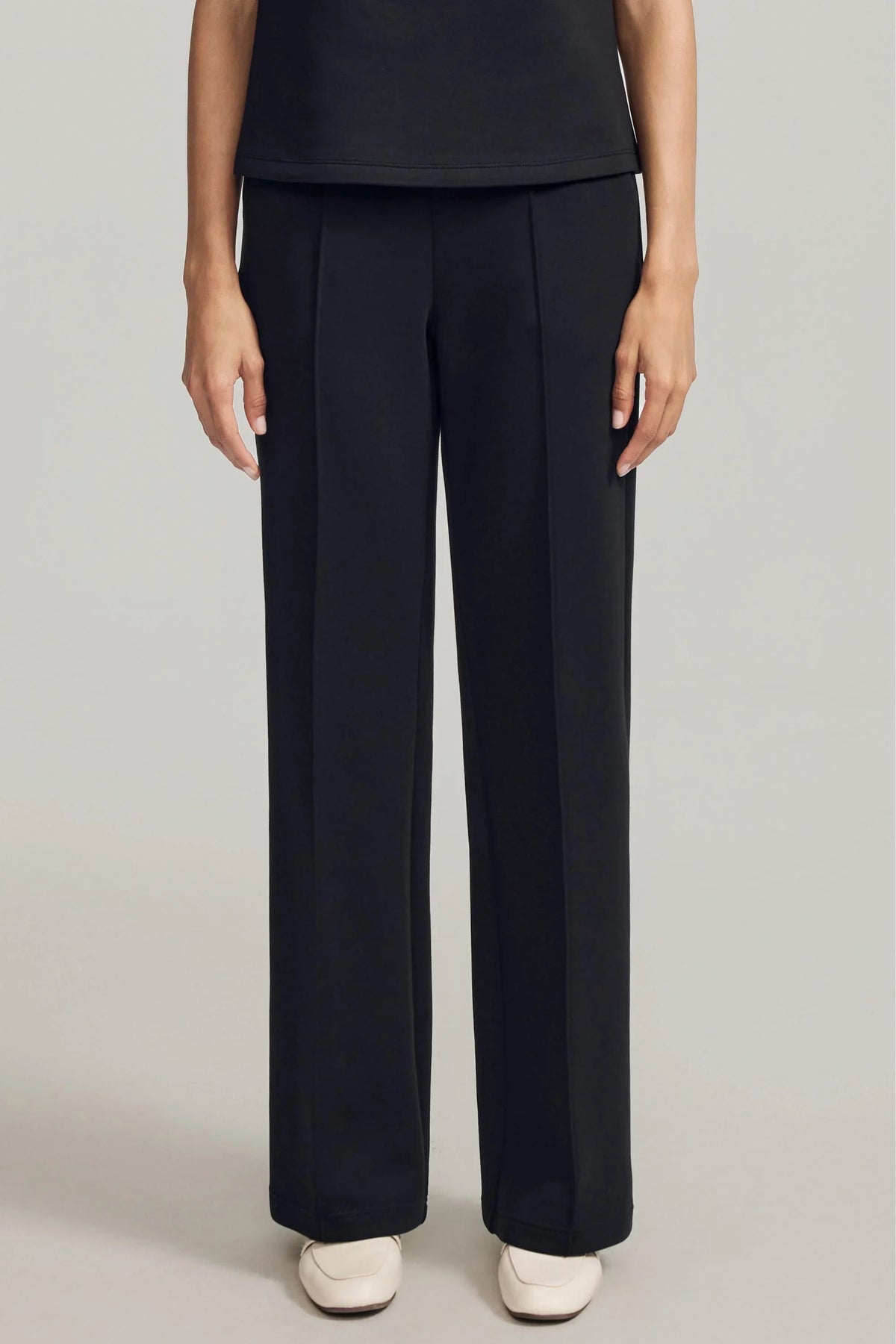 Women's straight-leg pants in Onyx Black with a clean silhouette and defined front seams