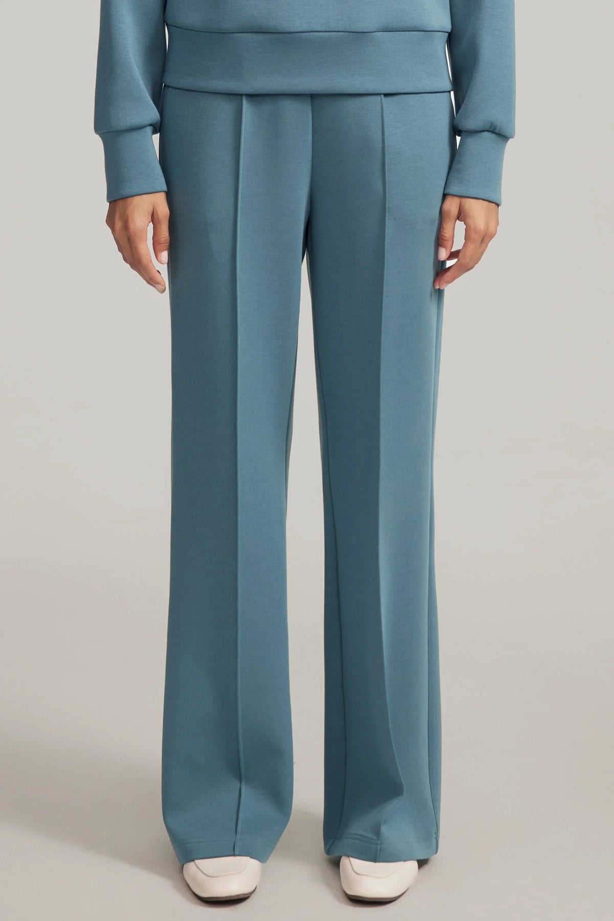 Women's straight-leg pants in Slate Blue with defined front seams and a relaxed full-length silhouette