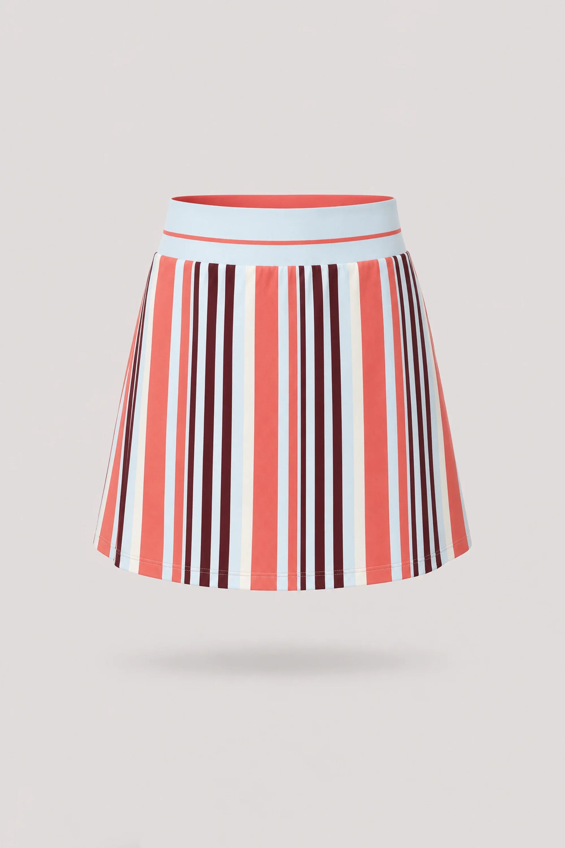 Women's striped golf skort in Resort Stripe print with lightweight stretch fabric and comfortable waistband