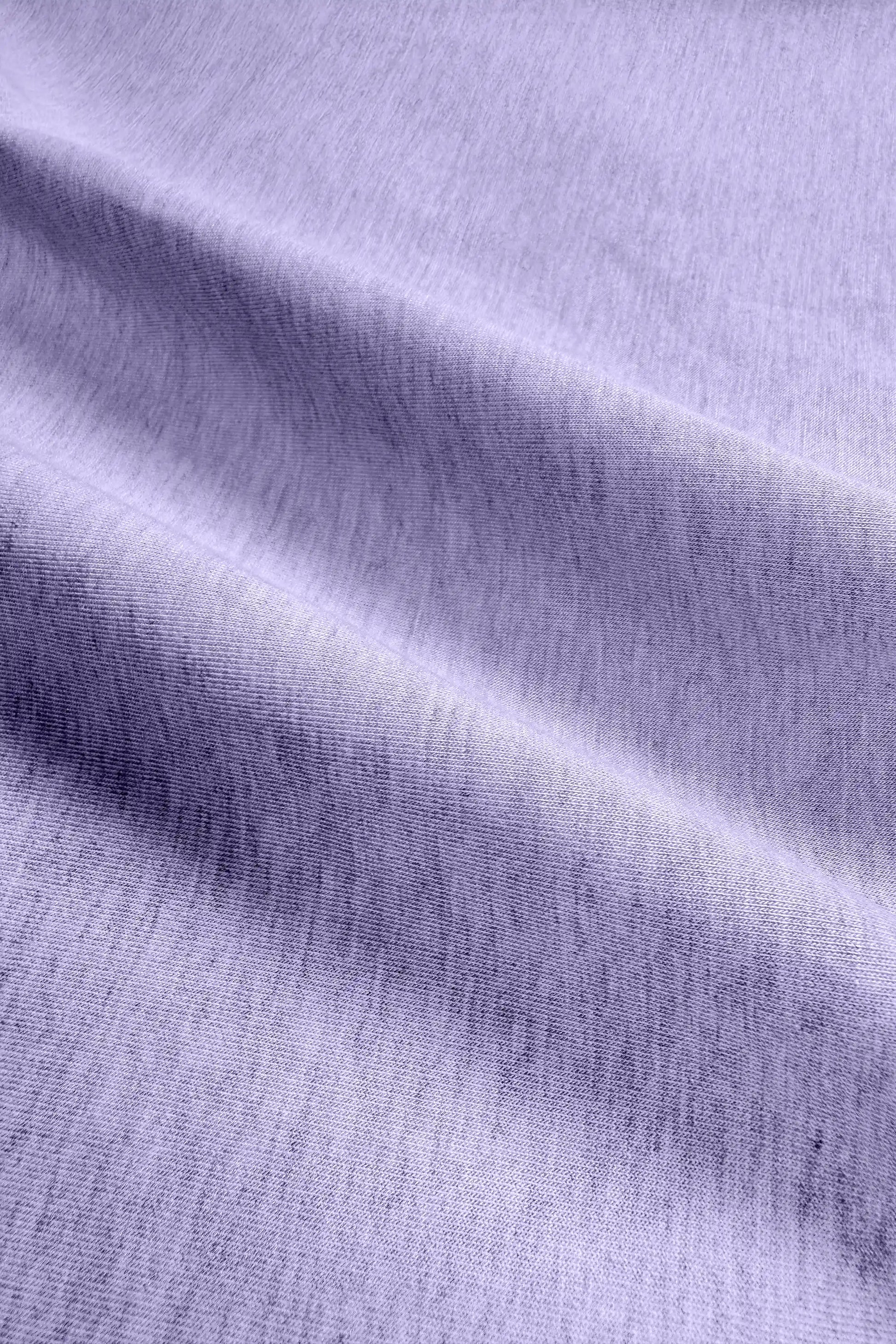 Close-up of the soft stretch fabric texture on the women’s lavender wrap golf skort