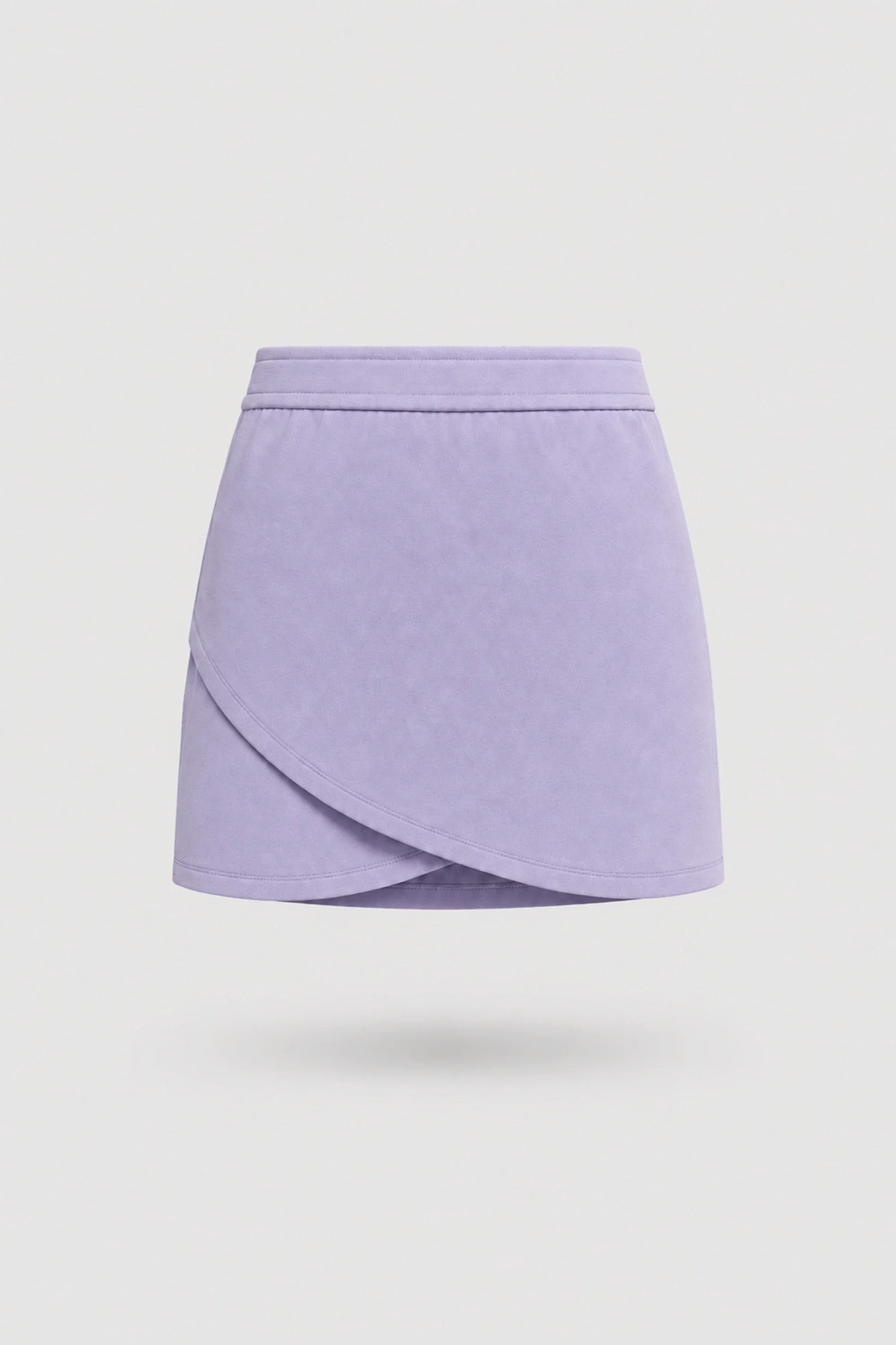 Women's Lavender wrap golf skort with elegant wrap-front silhouette and soft stretch fabric