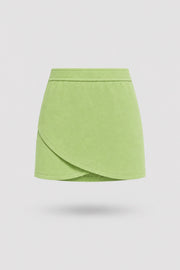 Women's wrap golf skort in lime green with sculpted silhouette and tailored fit